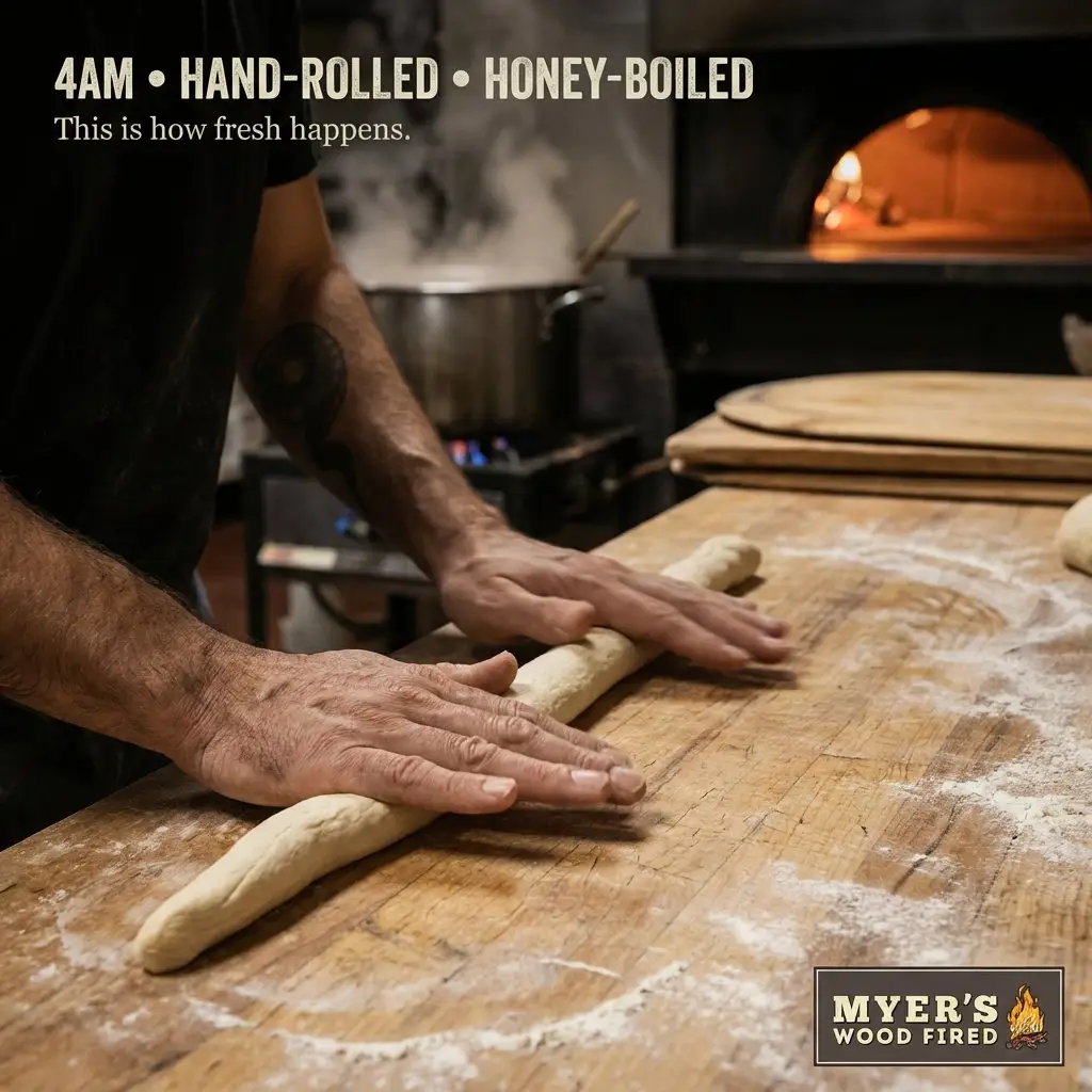 An AI-edited photo posted to social media from Myer's Bagels is pictured.