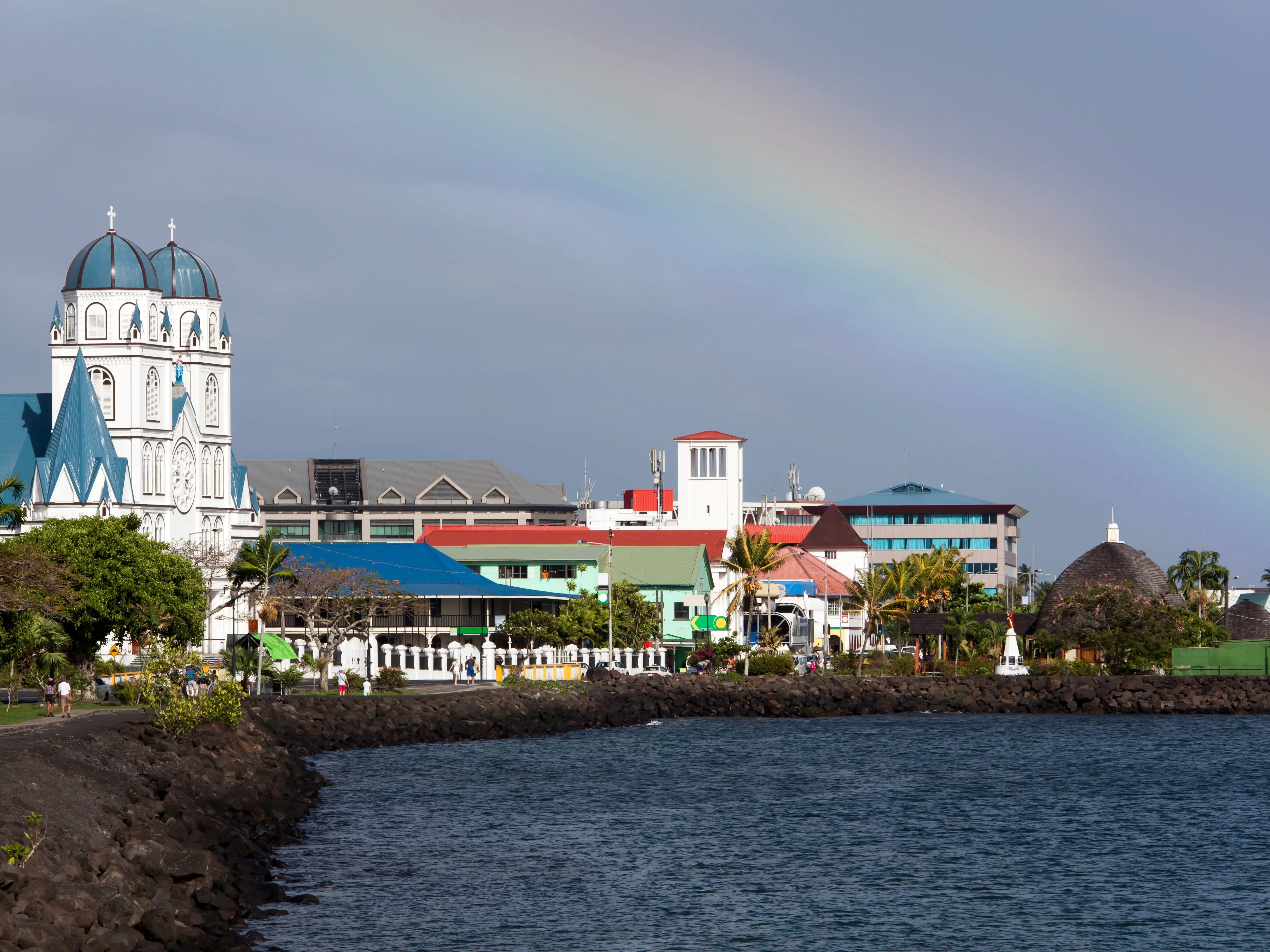 A rainbow over buildings in Apia, Samoa.