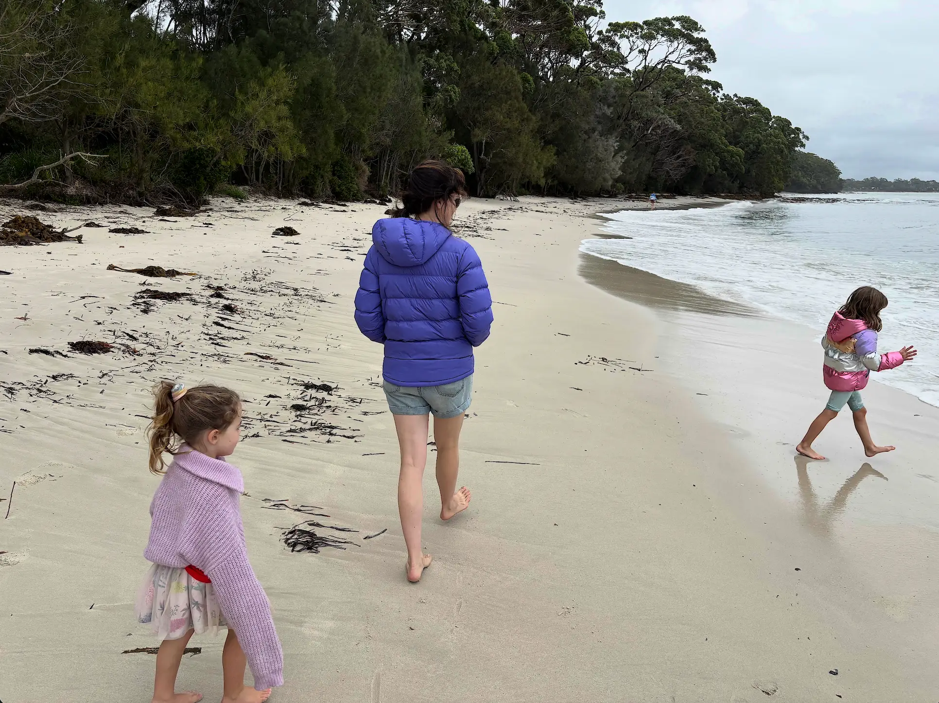 The author and two of her kids on the beach.
