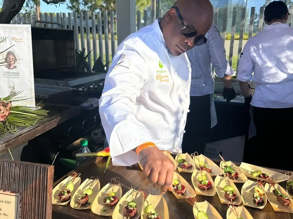 Jay Hinson preparing small bites for The Cheesecake Factory