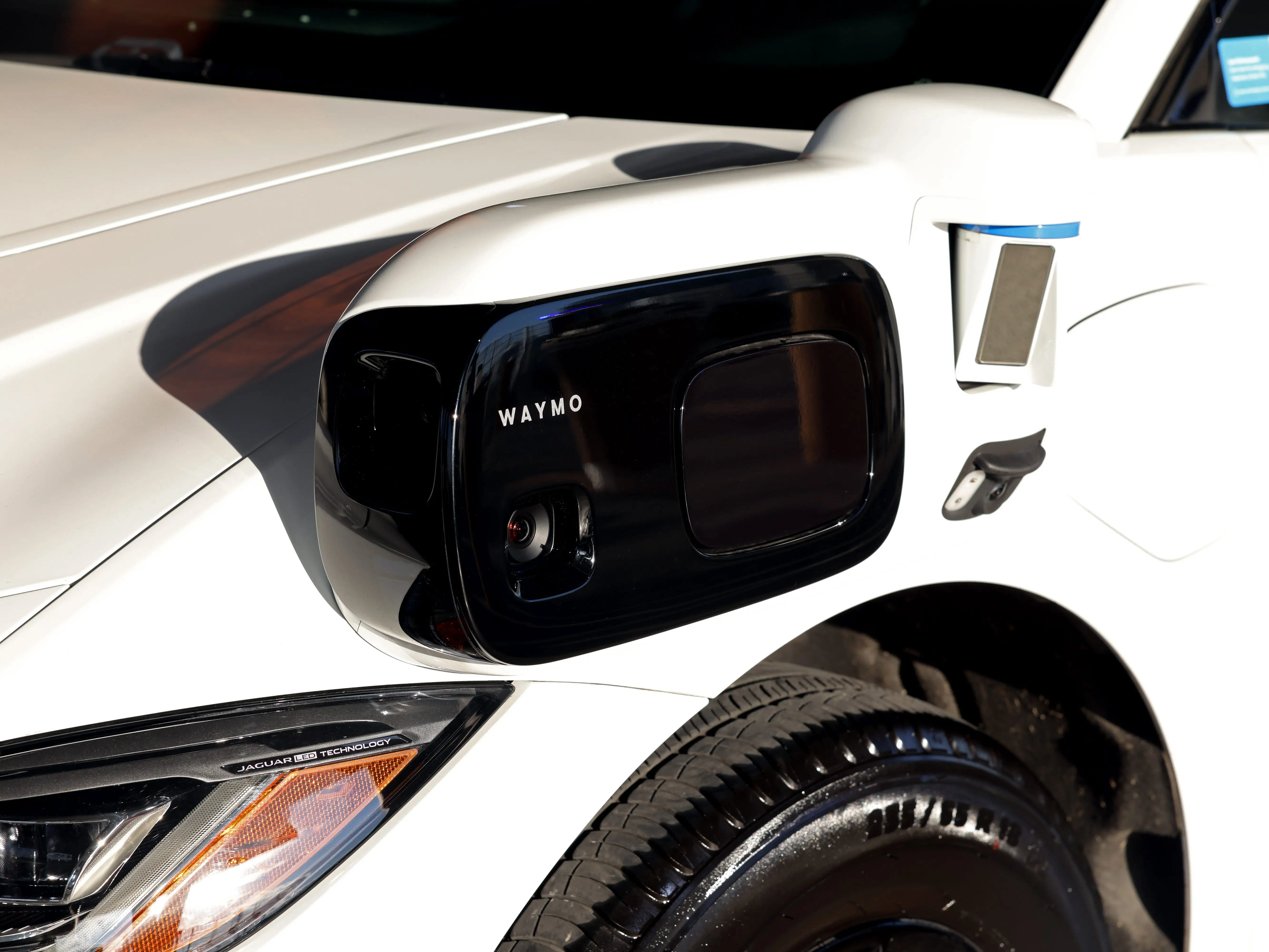 A camera attached to a Waymo