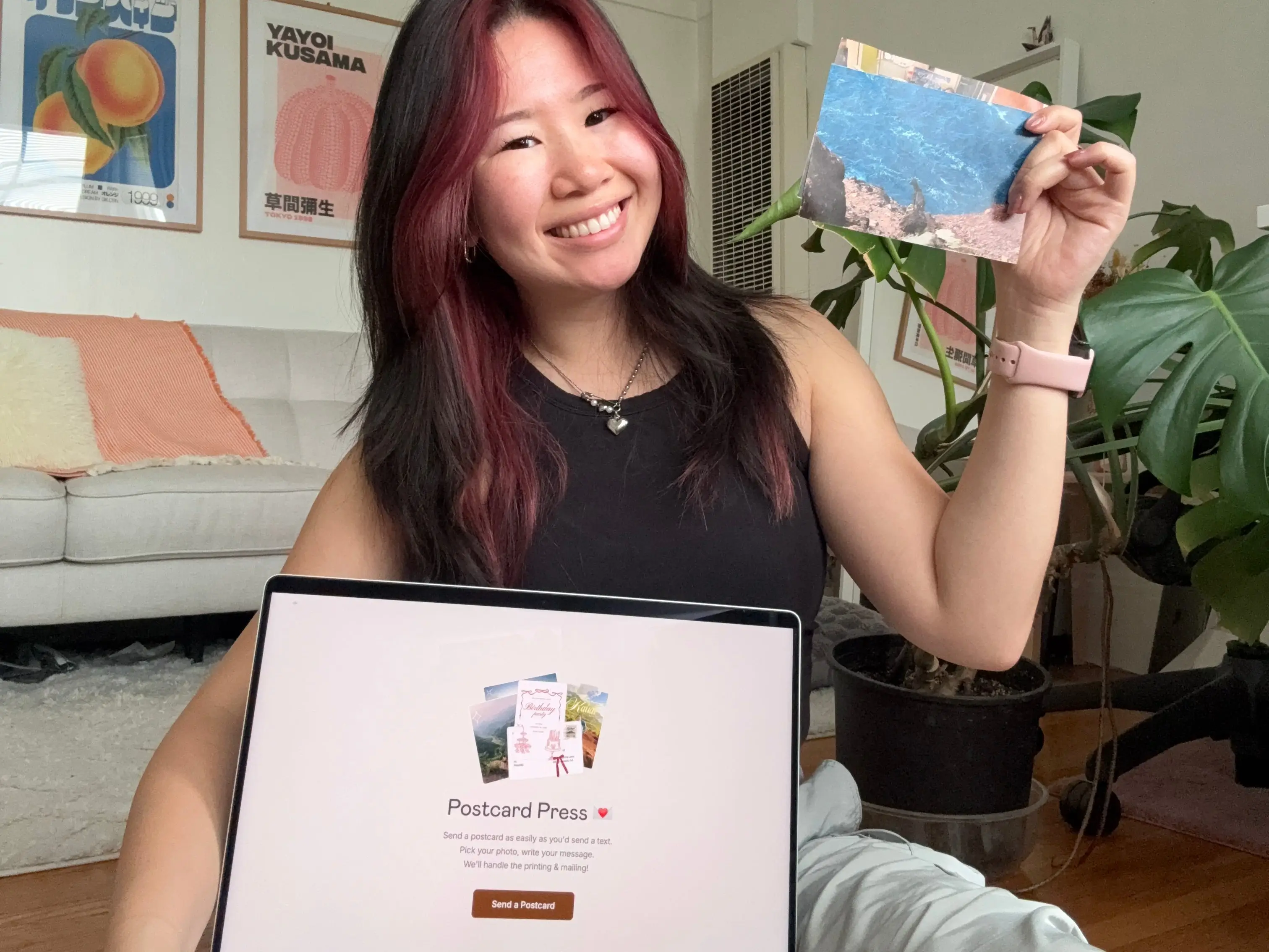 Priscilla Tina with her Postcard Press app.
