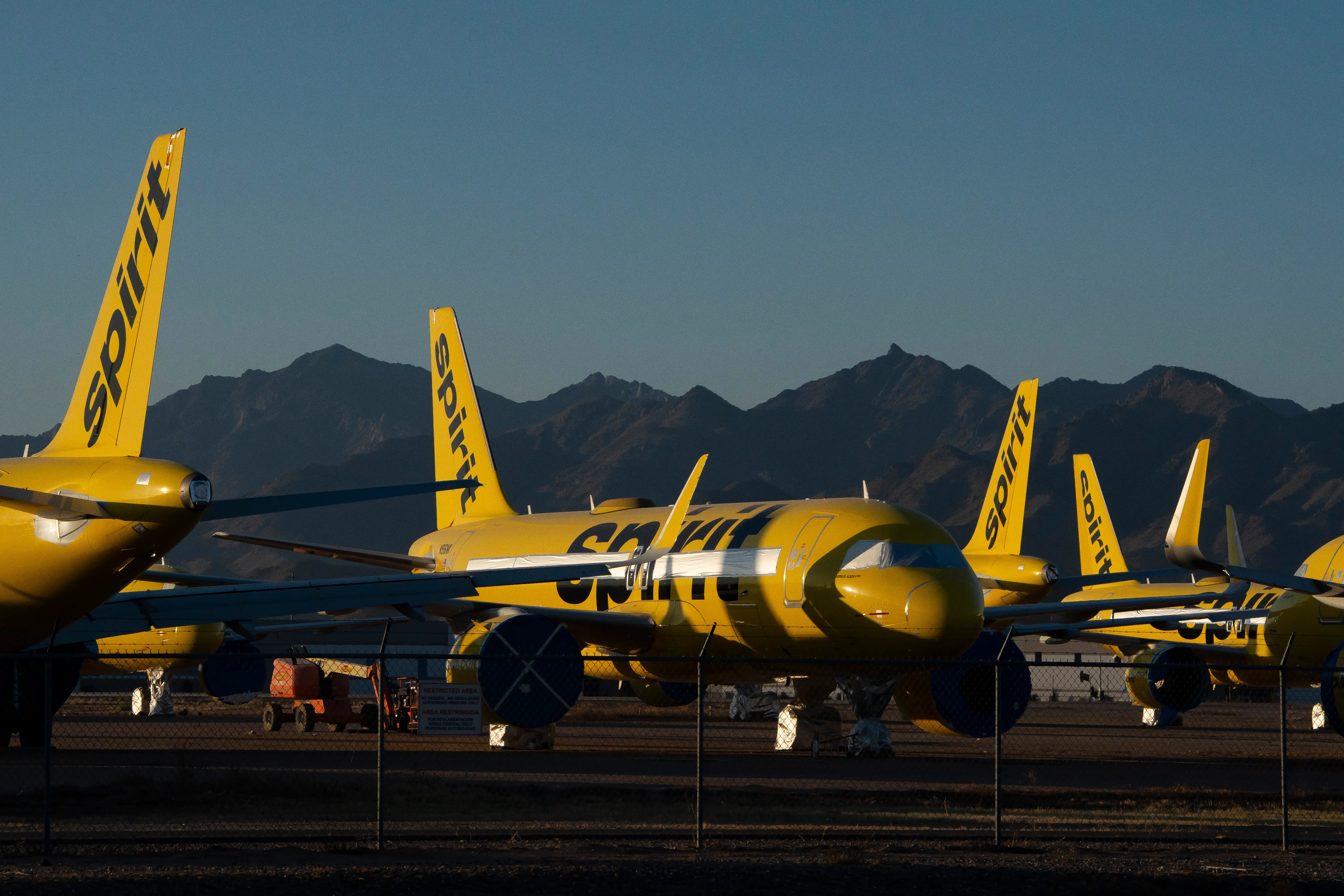 Spirit Airlines planes sit parked at the Phoenix Goodyear Airport on May 8, 2026 in Goodyear, Arizona. The budget airline ceased all operations on May 2, 2026.