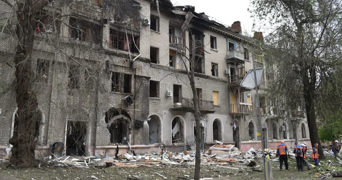 ‘Thank God, I’m alive’: A Russian attack tore open this Ukrainian neighborhood, but residents were quick to start picking up the pieces