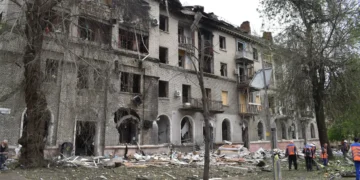 ‘Thank God, I’m alive’: A Russian attack tore open this Ukrainian neighborhood, but residents were quick to start picking up the pieces