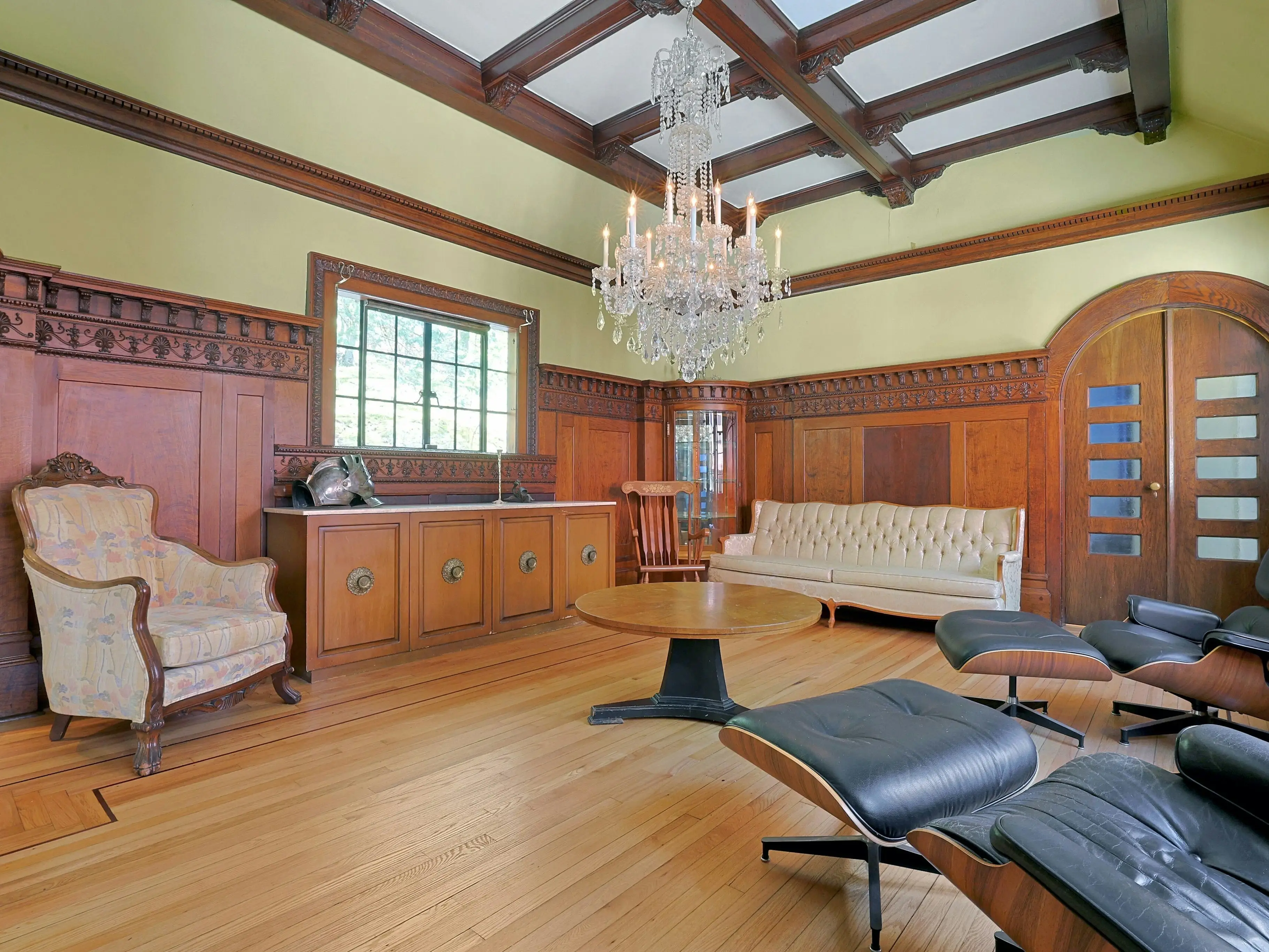 Chandelier in living space with furniture