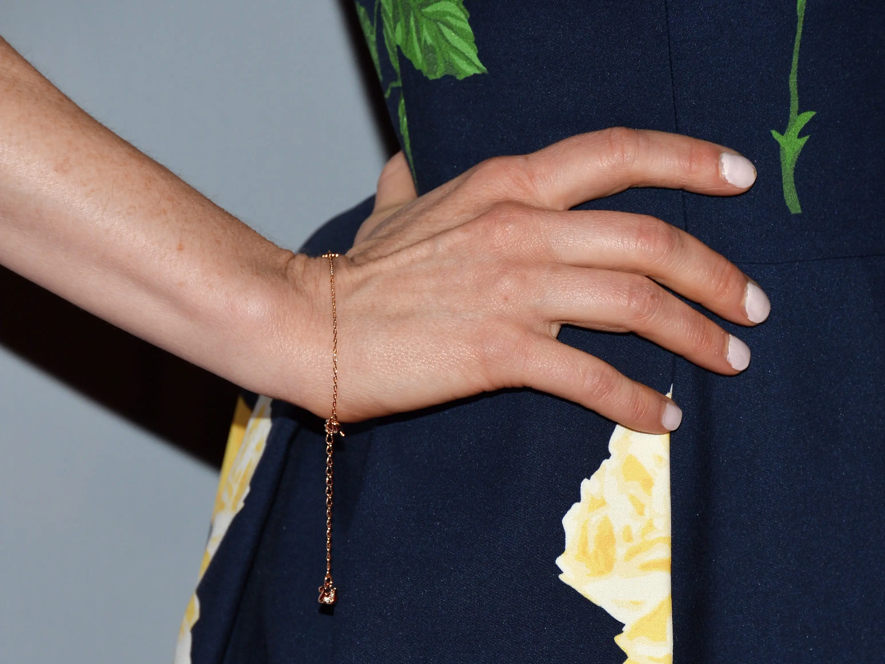 A dainty chain bracelet on a woman's wrist.
