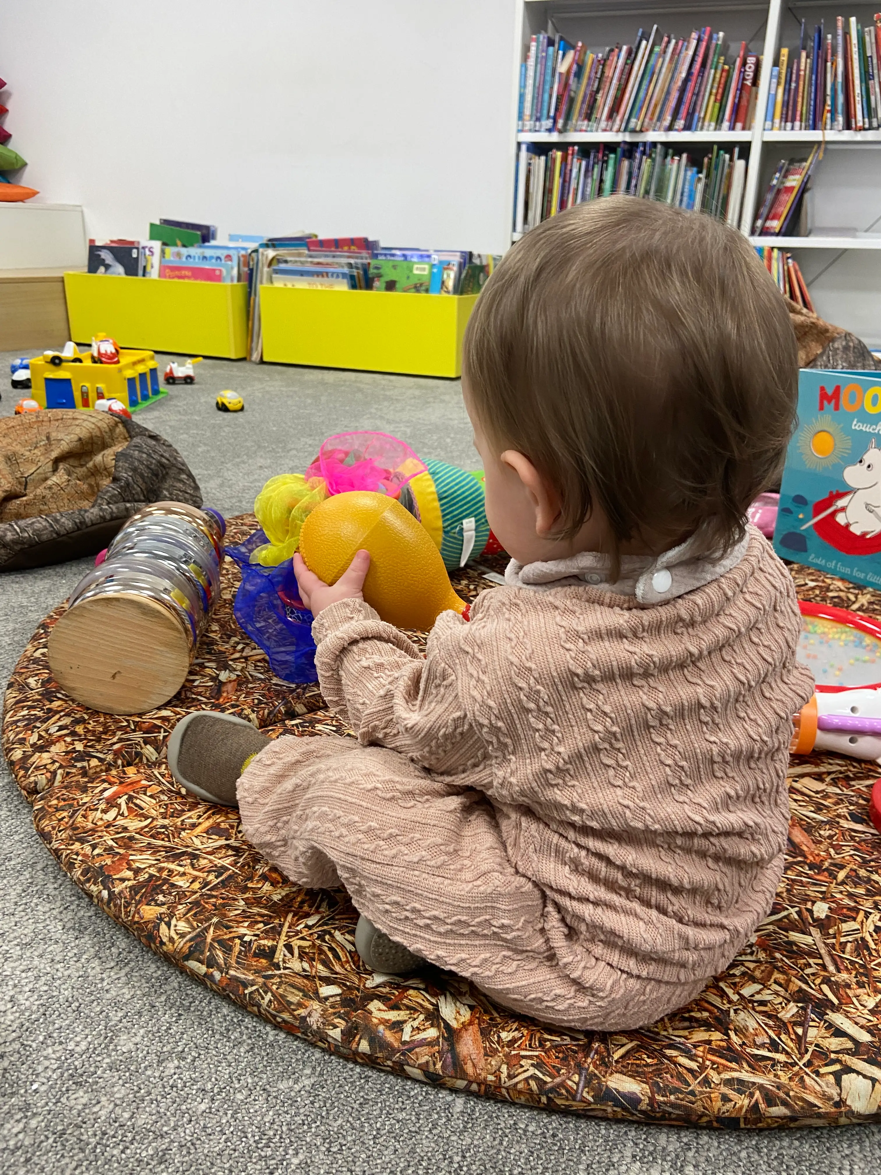 the author's daughter at playtime in a London library