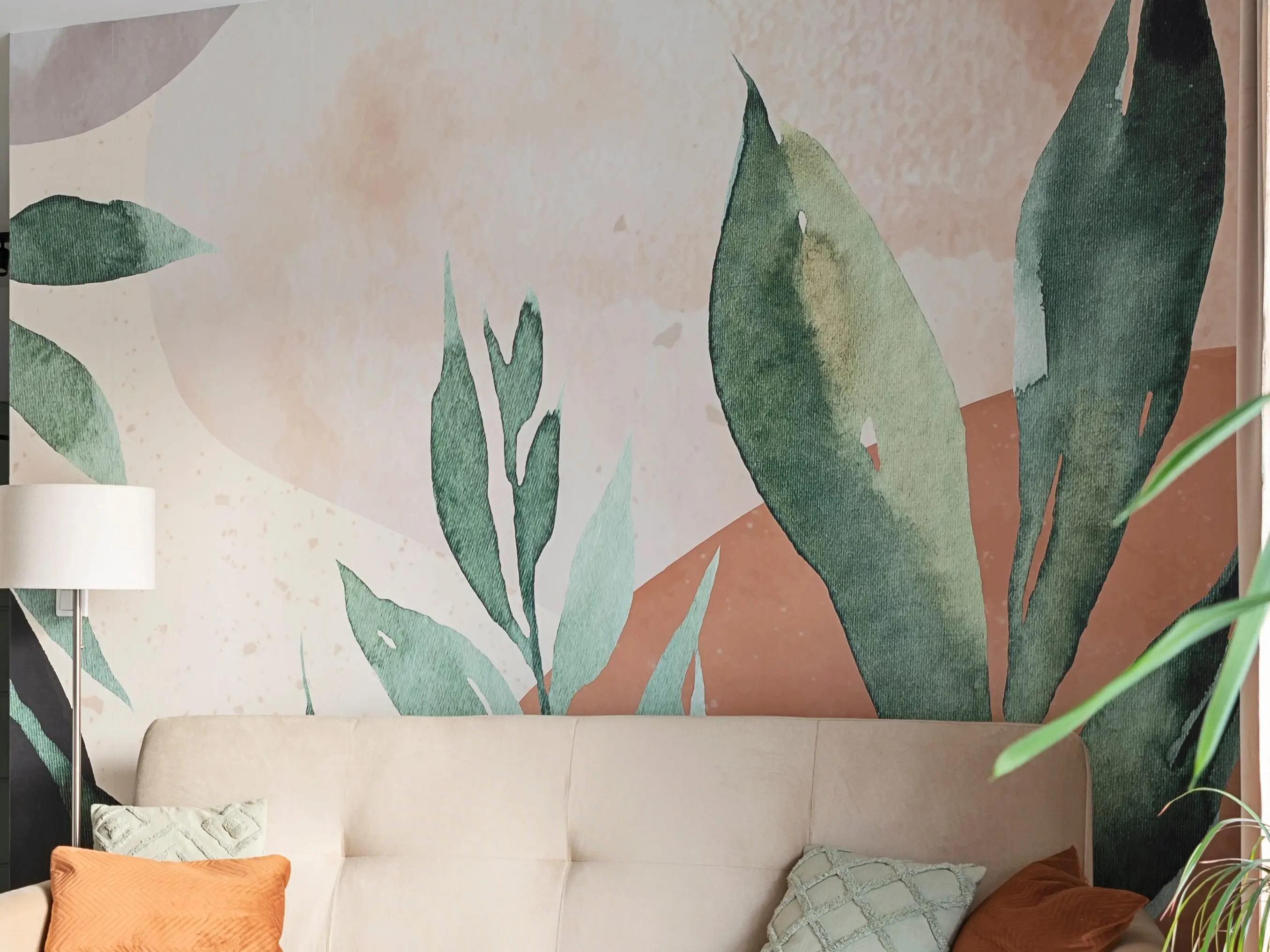 A living room with busy wallpaper.