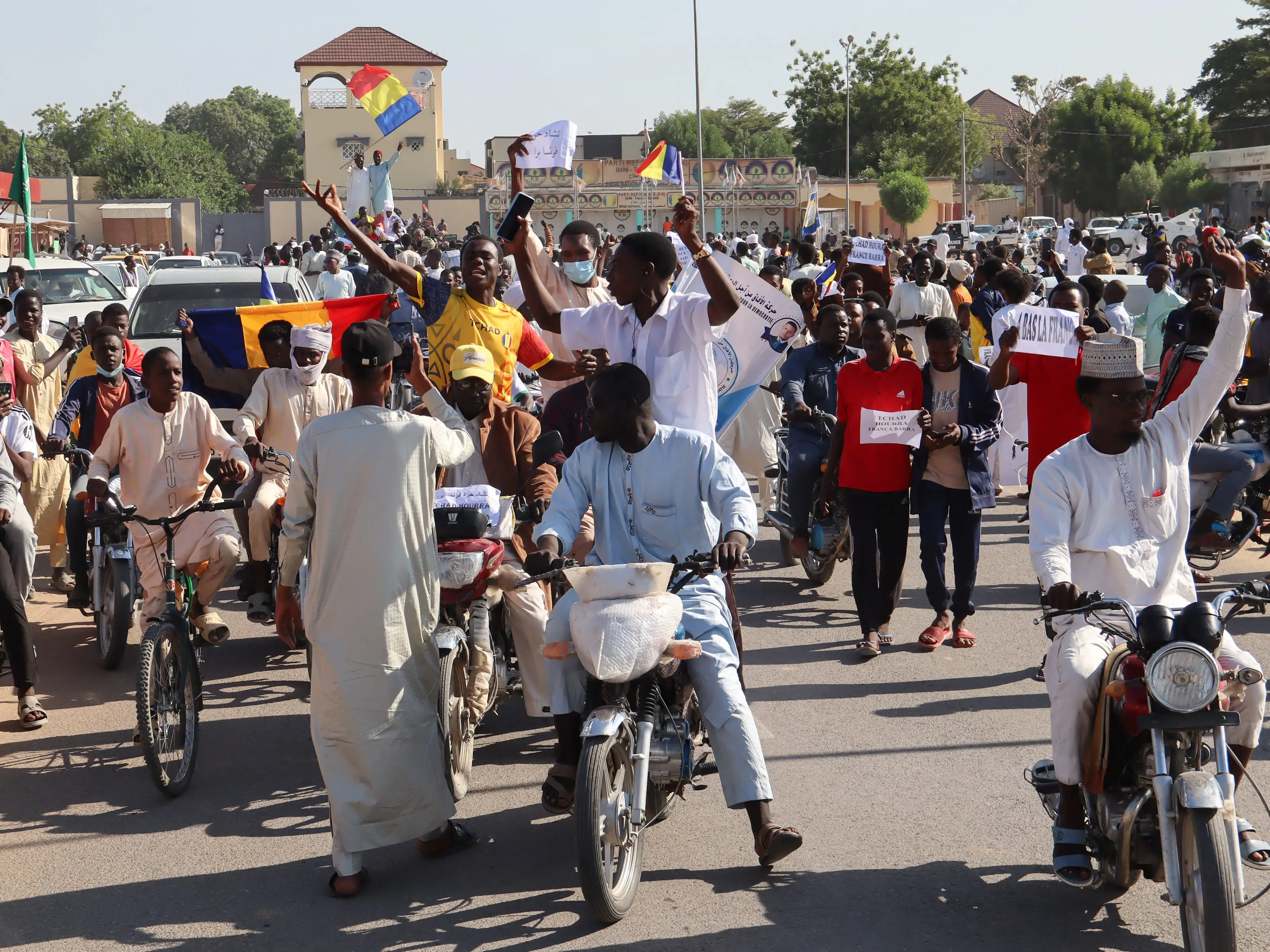 People celebrate on motorcycles in N'djamena, Chad.