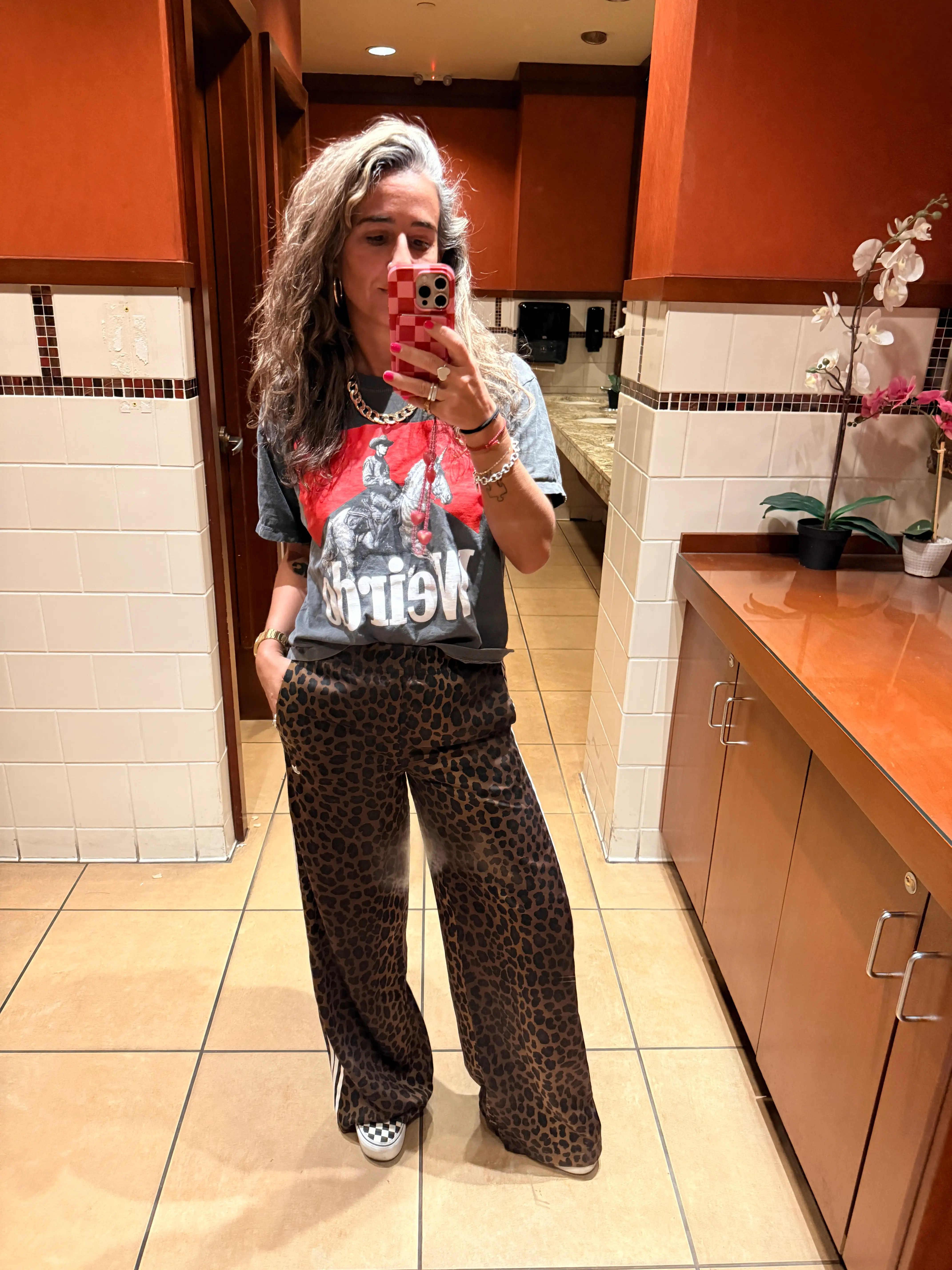 Woman taking bathroom selfie