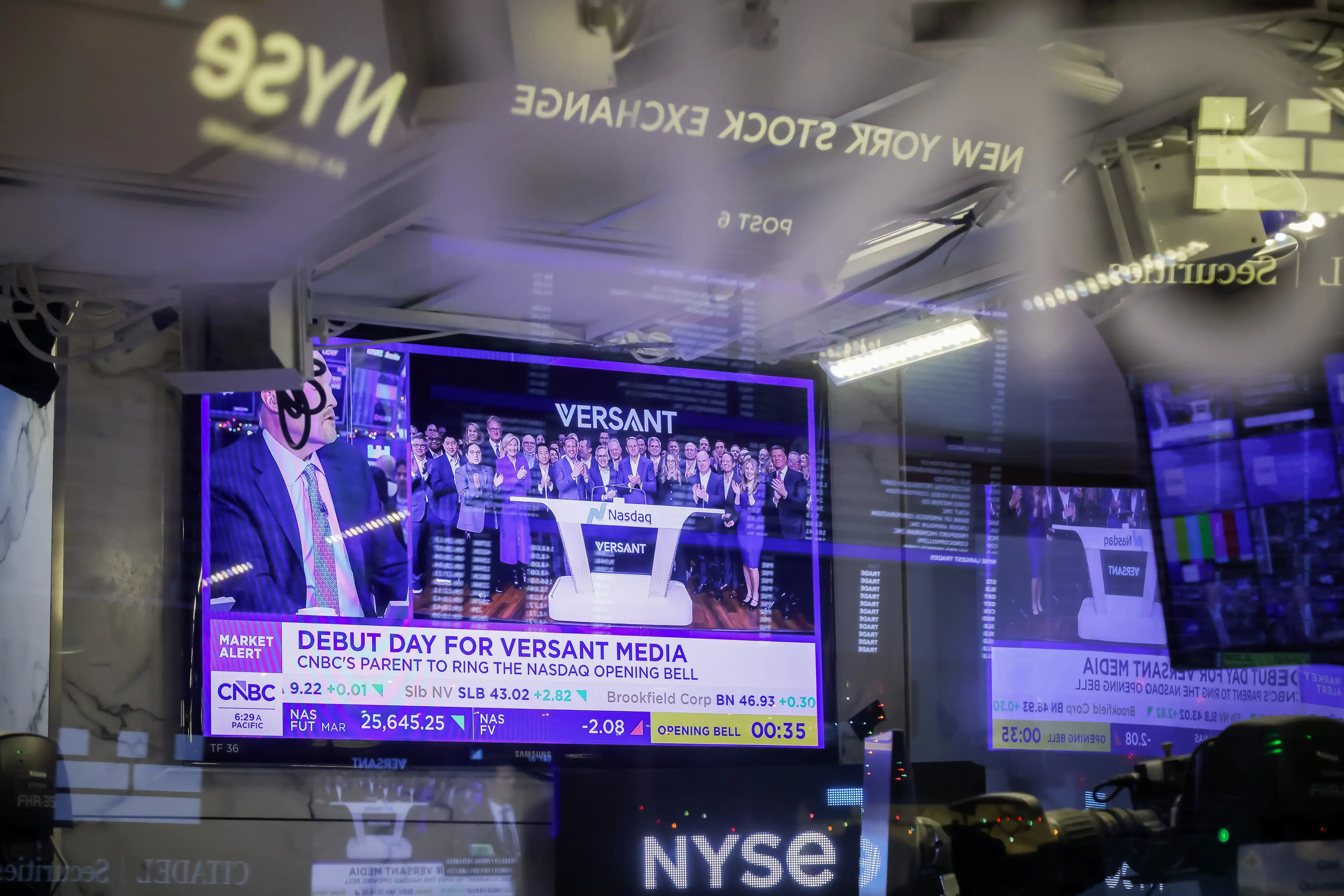 A TV plays CNBC on the floor of the New York Stock Exchange