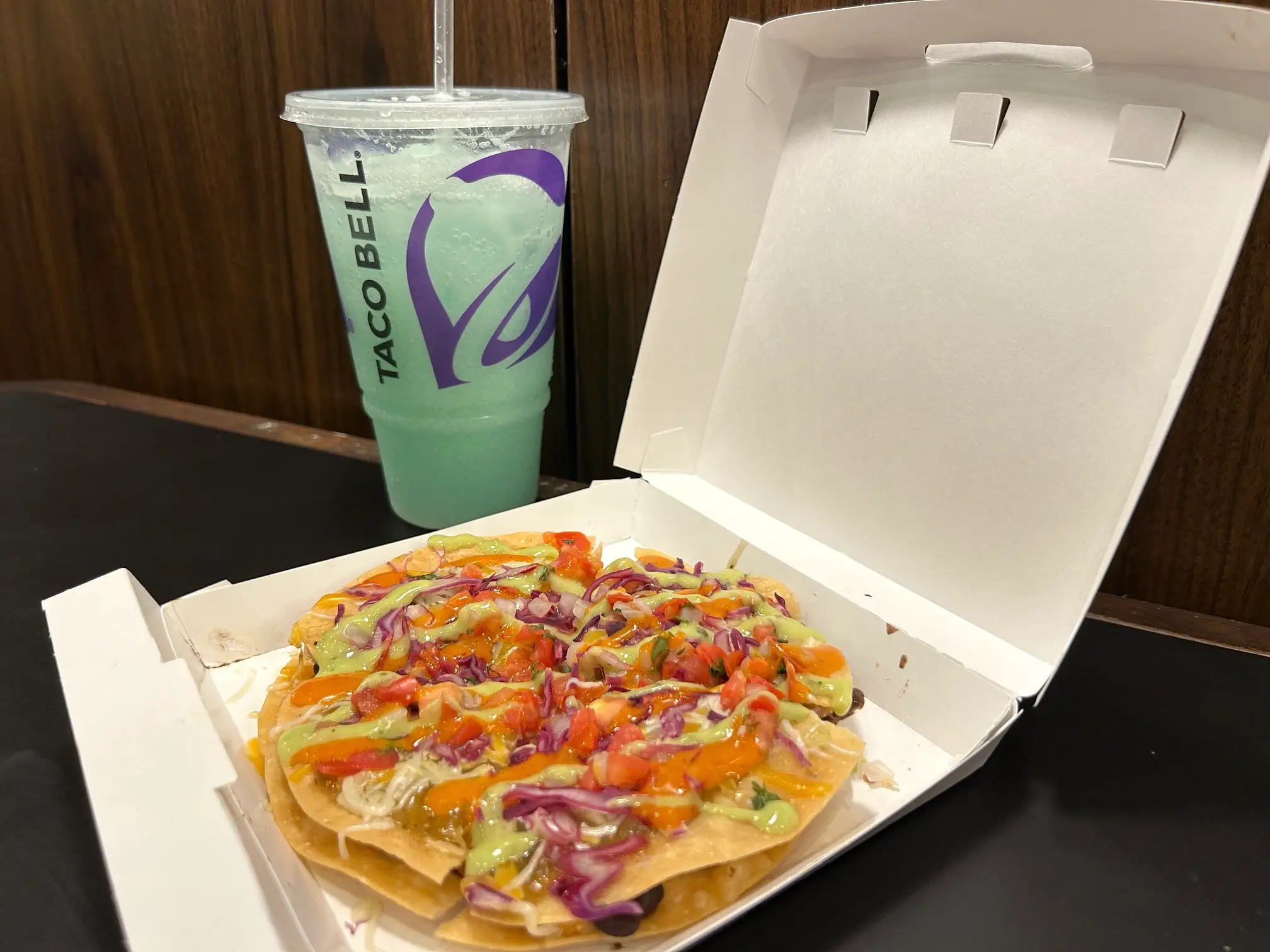 Taco Bell Cantina Chicken Mexican Pizza with new orange salsa on top
