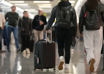 More Americans are ditching summer vacations, but travelers still going away are upping their spending