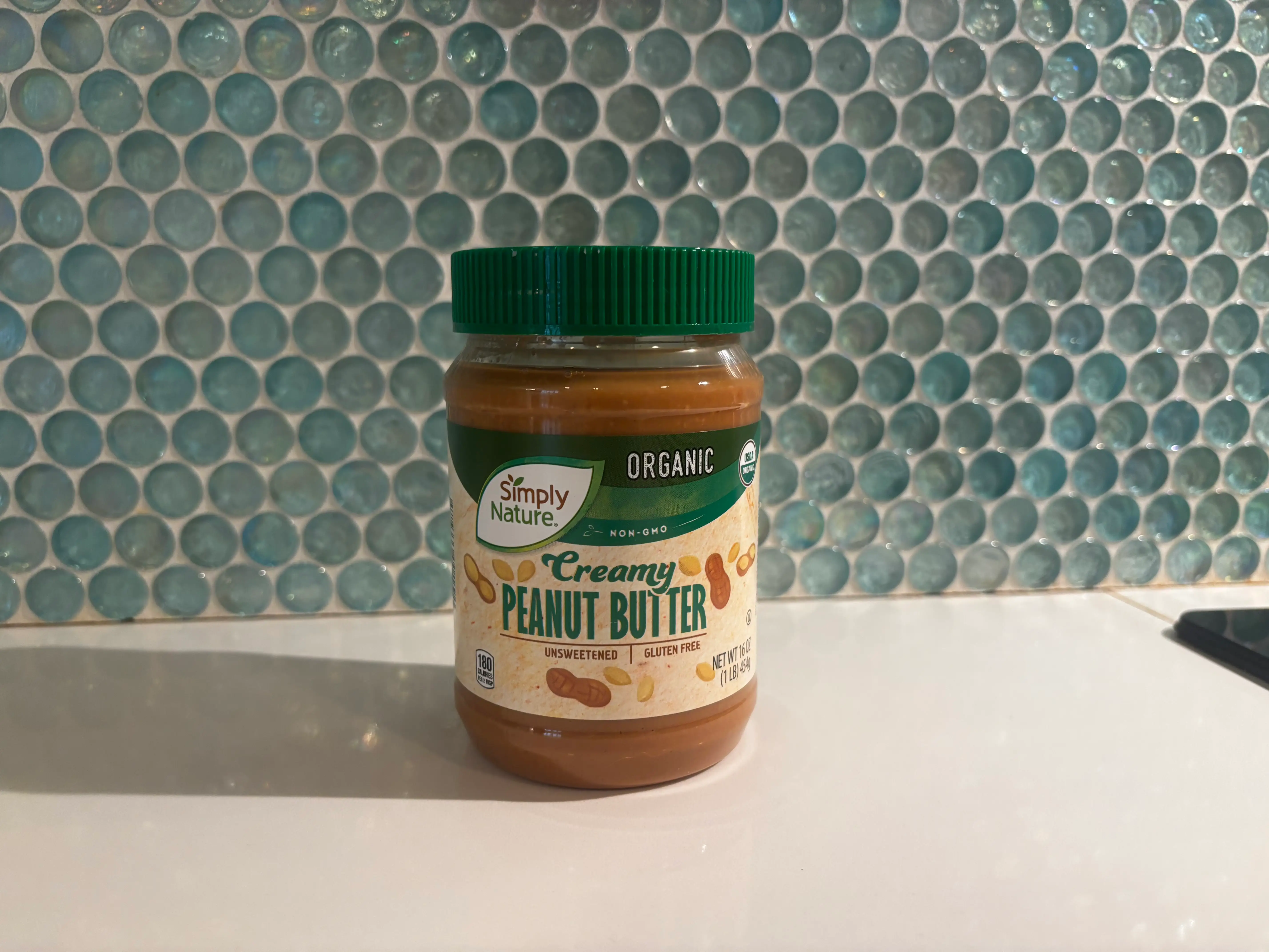 Jar of Simply Nature Creamy Peanut Butter