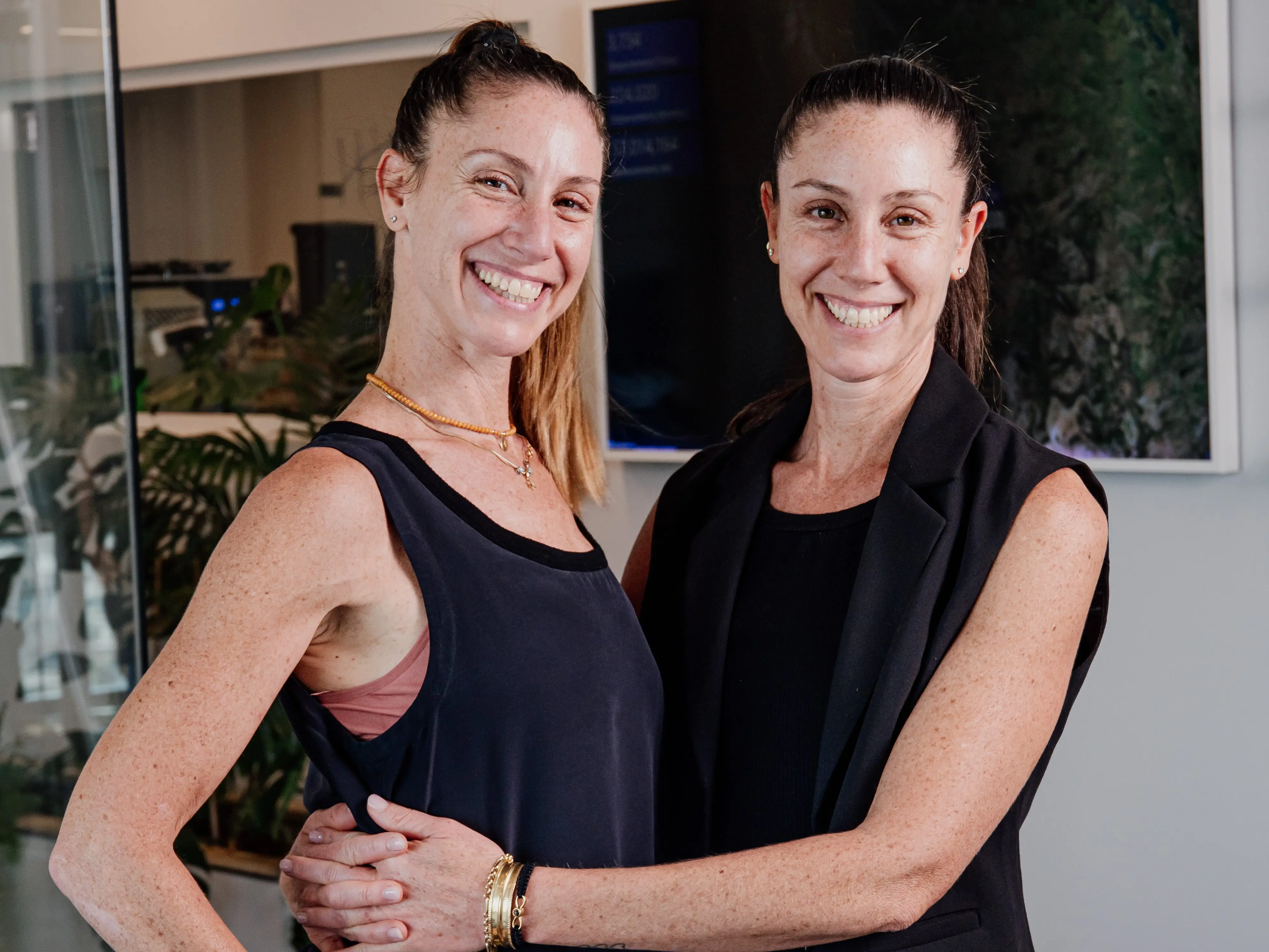 A pair of identical twin sisters and company cofounders