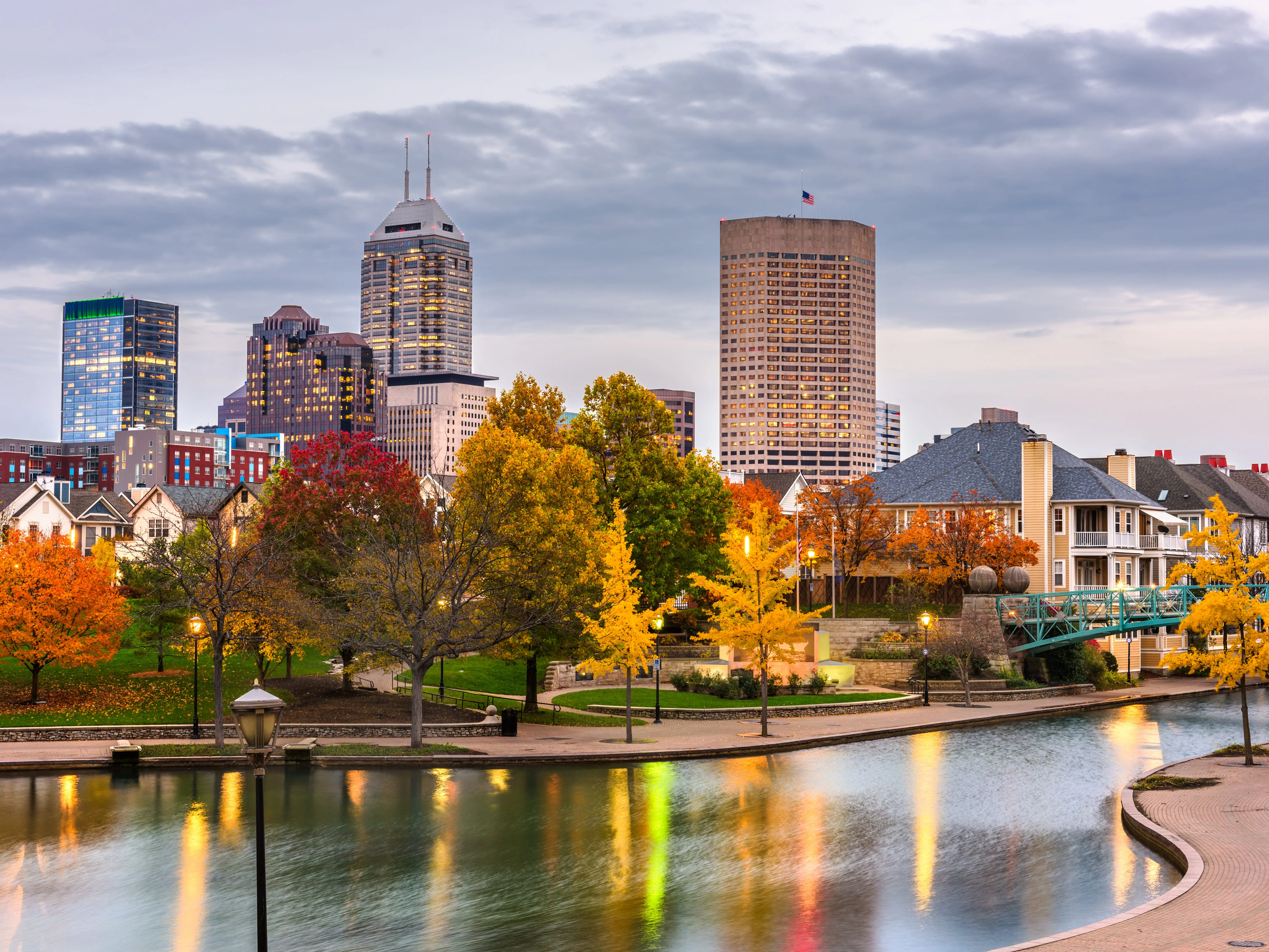 Indianapolis, Indiana, USA downtown cityscape on the White River at dusk.