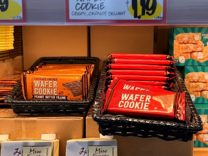 A basket full of Trader Joe's chocolate-covered wafer cookie bars.