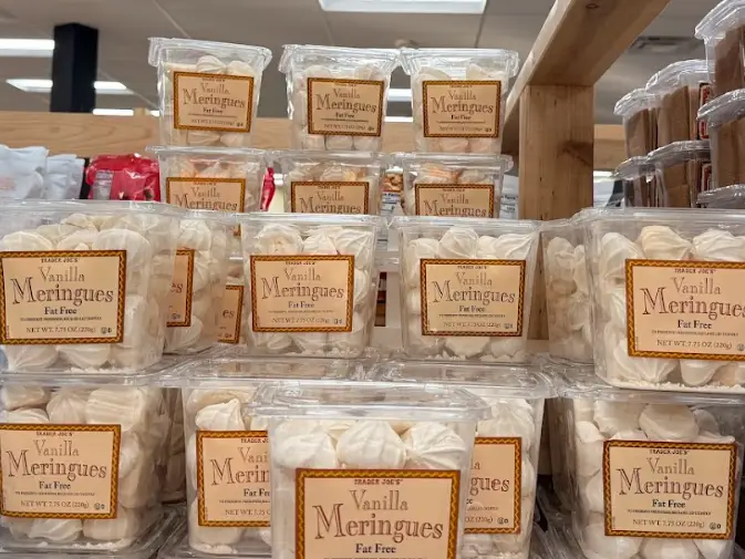 Multiple containers of Trader Joe's vanilla meringues.
