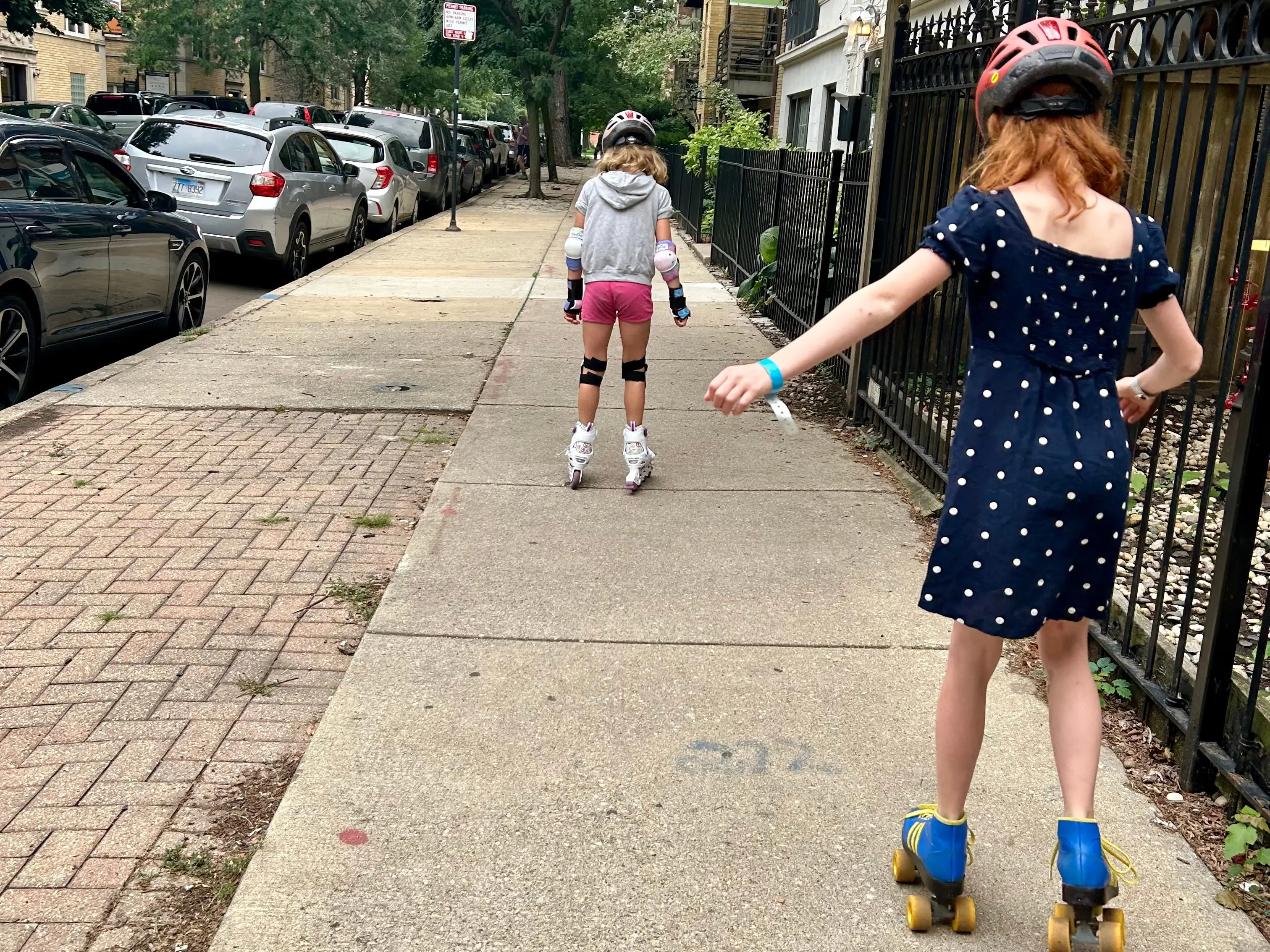 two little girls roller blading