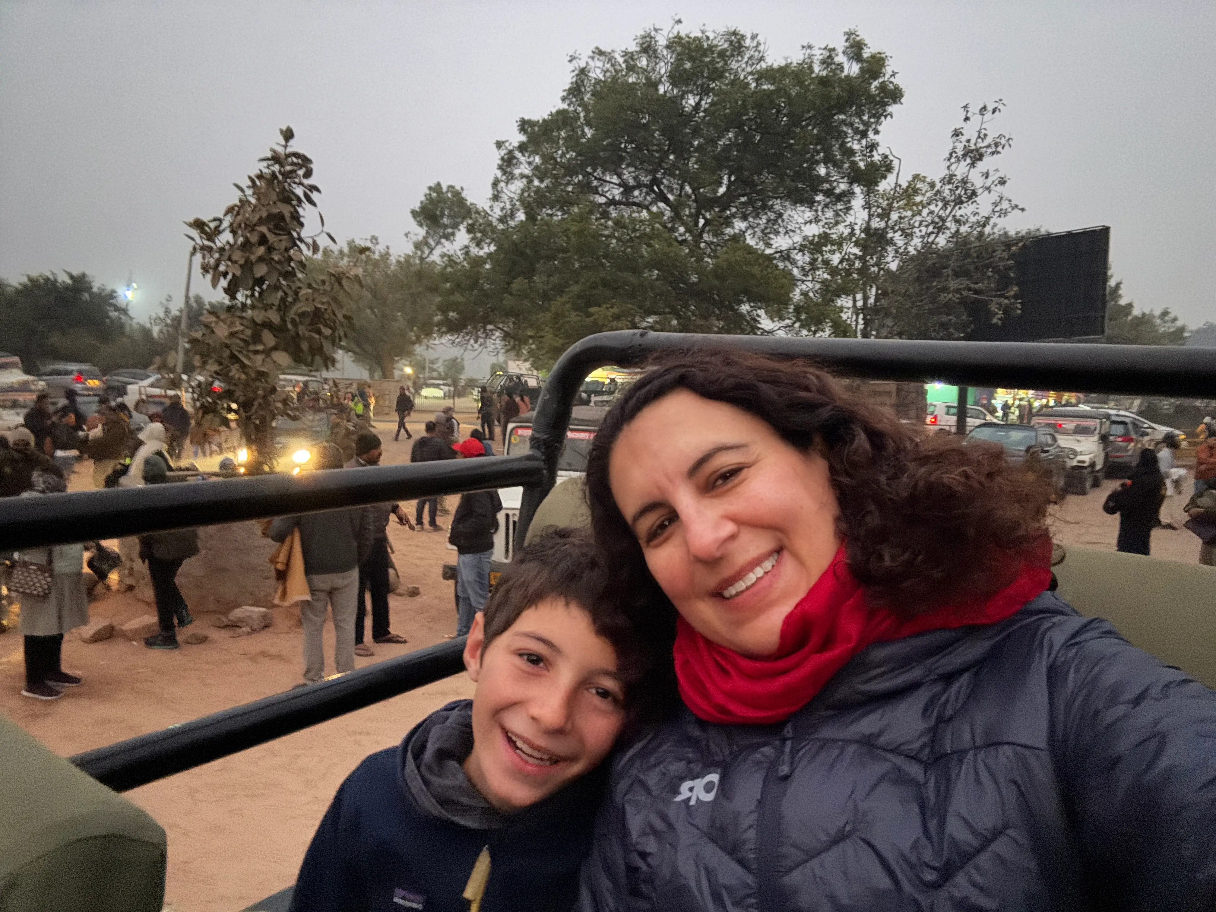 Th eauthor and her son on an open-air vehicle.