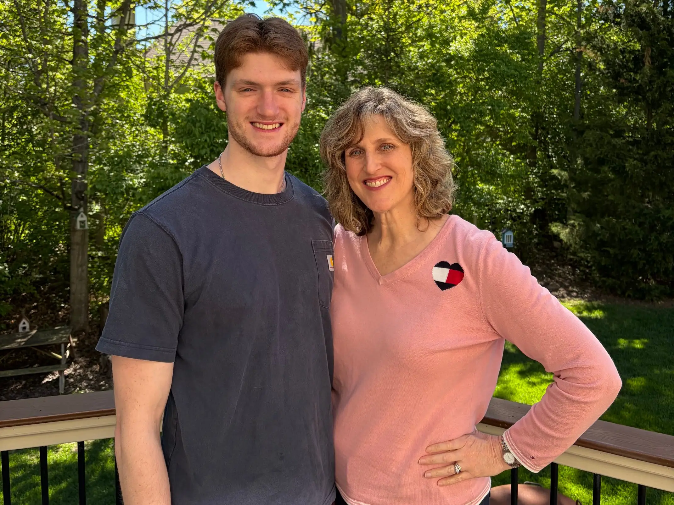 Katy M. Clark and her son outside