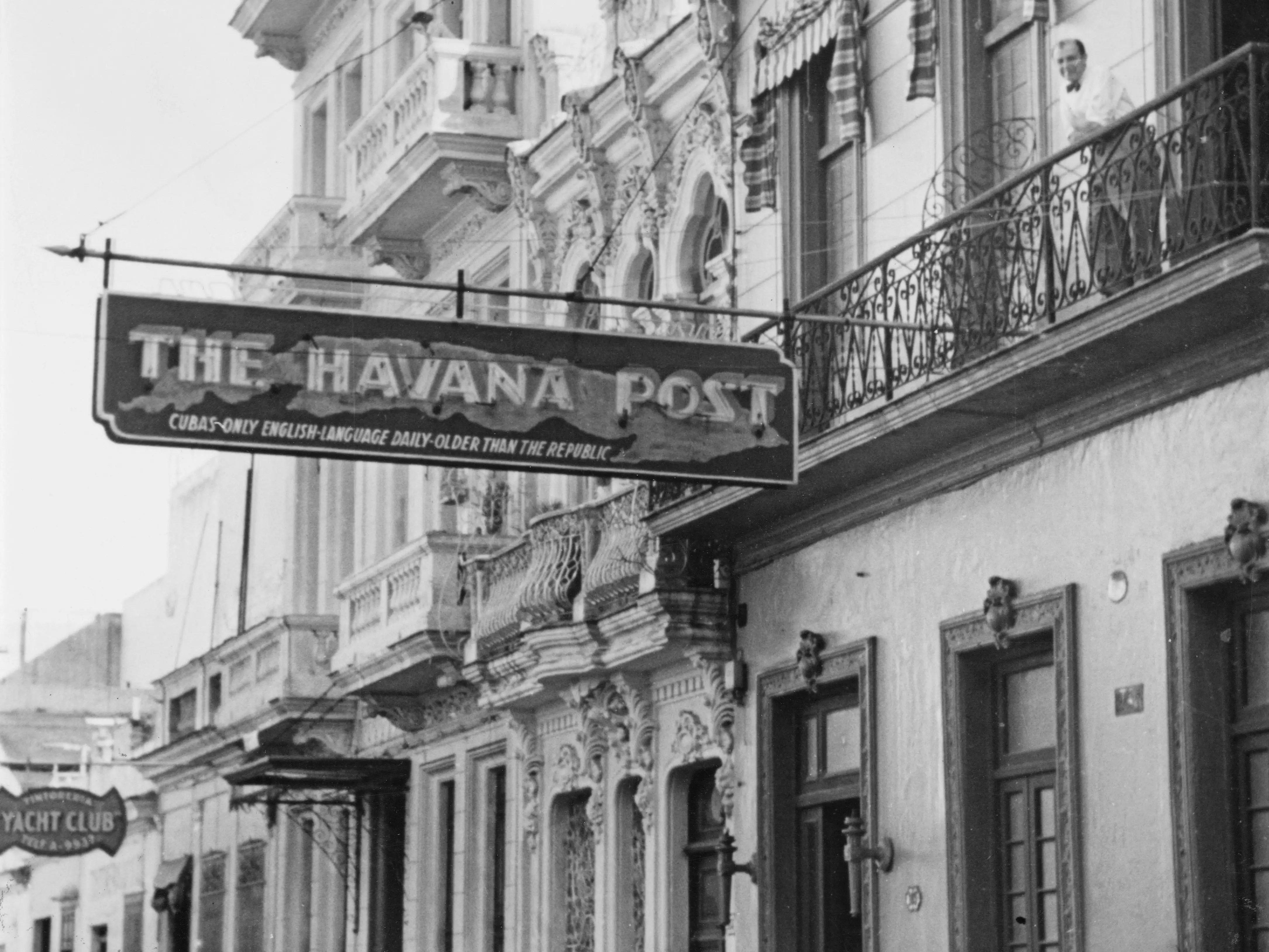 The offices of 'The Havana Post' newspaper in Havana, Cuba, 1950s. The sign reads 'The Havana Post. Cuba's only English-language daily older than the republic'.