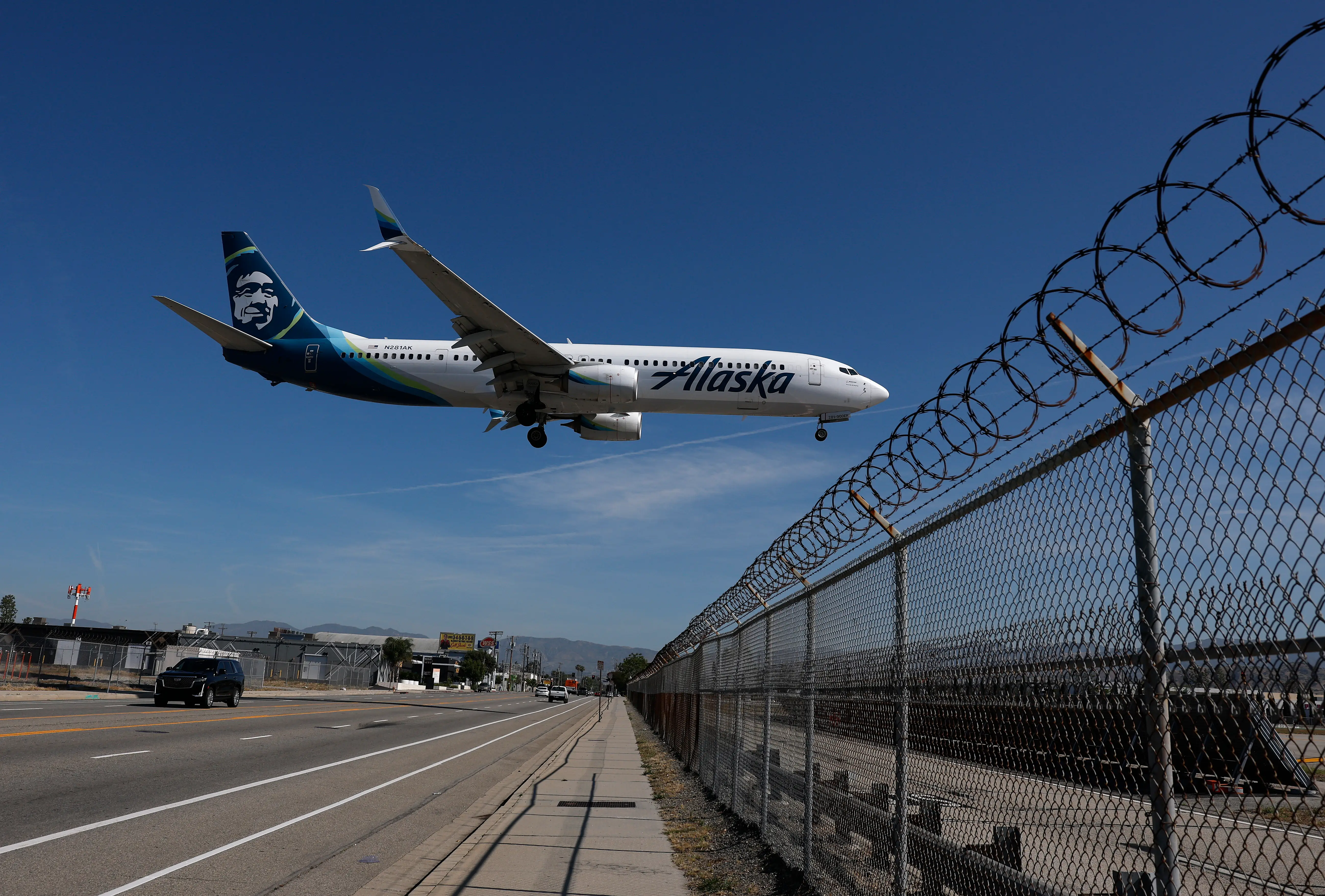An Alaska Airlines plane lands at Hollywood Burbank Airport on April 20, 2026 in Burbank, California