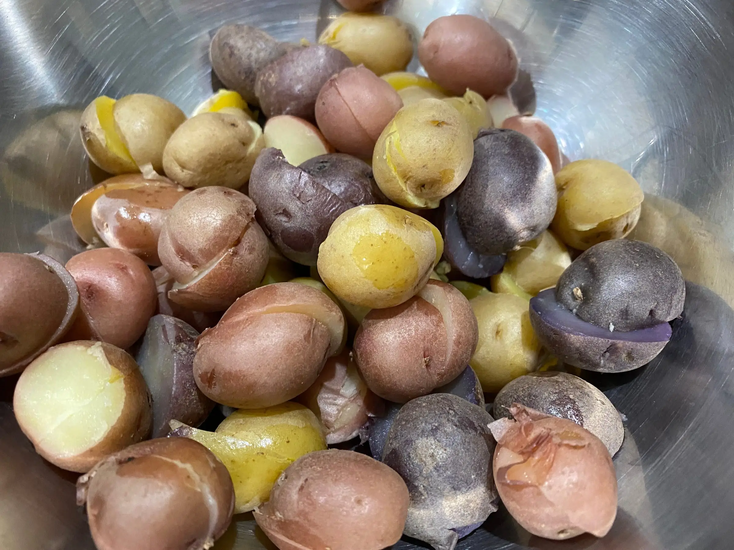 colorful small boiled potatoes in bowl