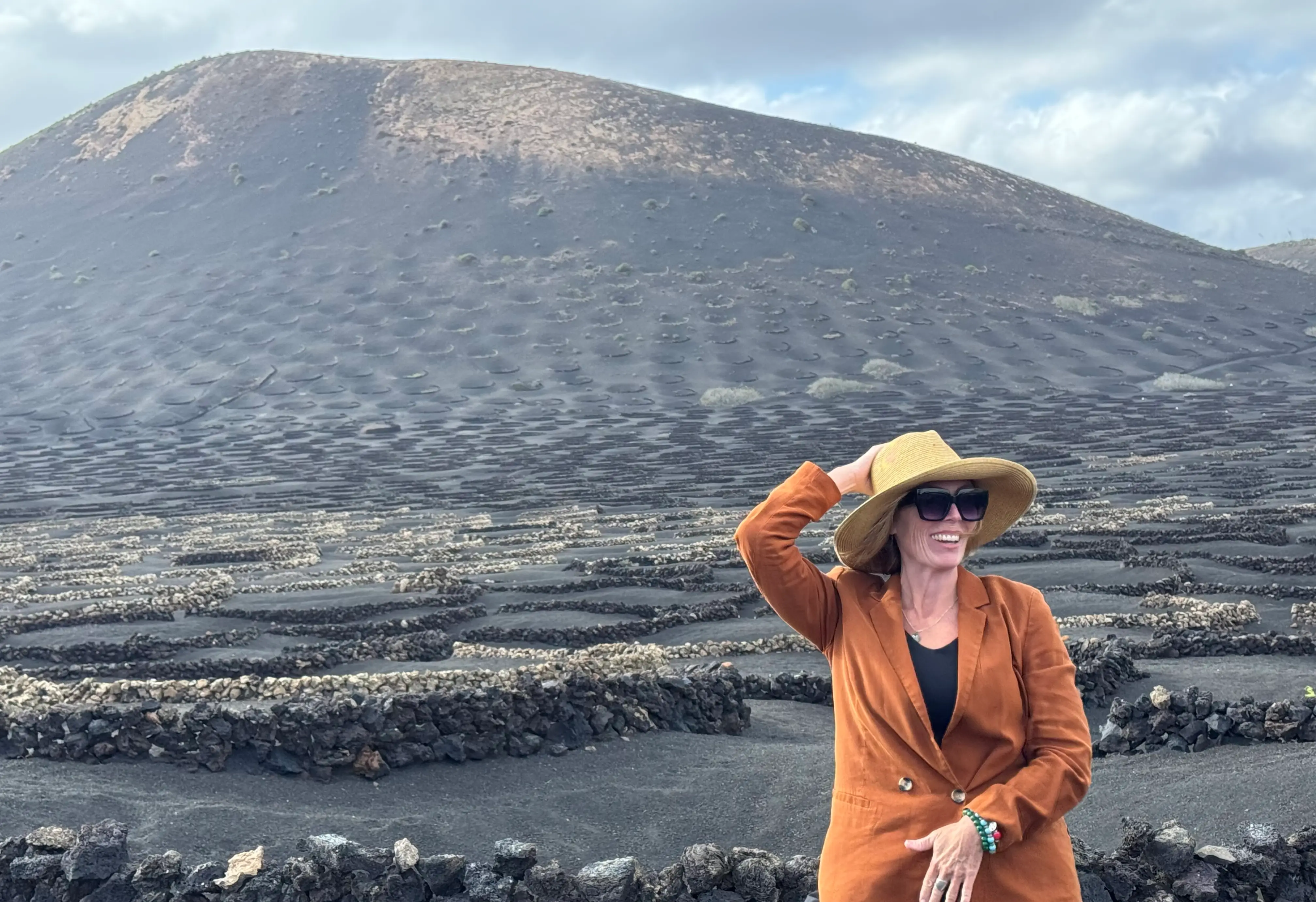 The author poses on one of the trips she's taken as a travel writer.