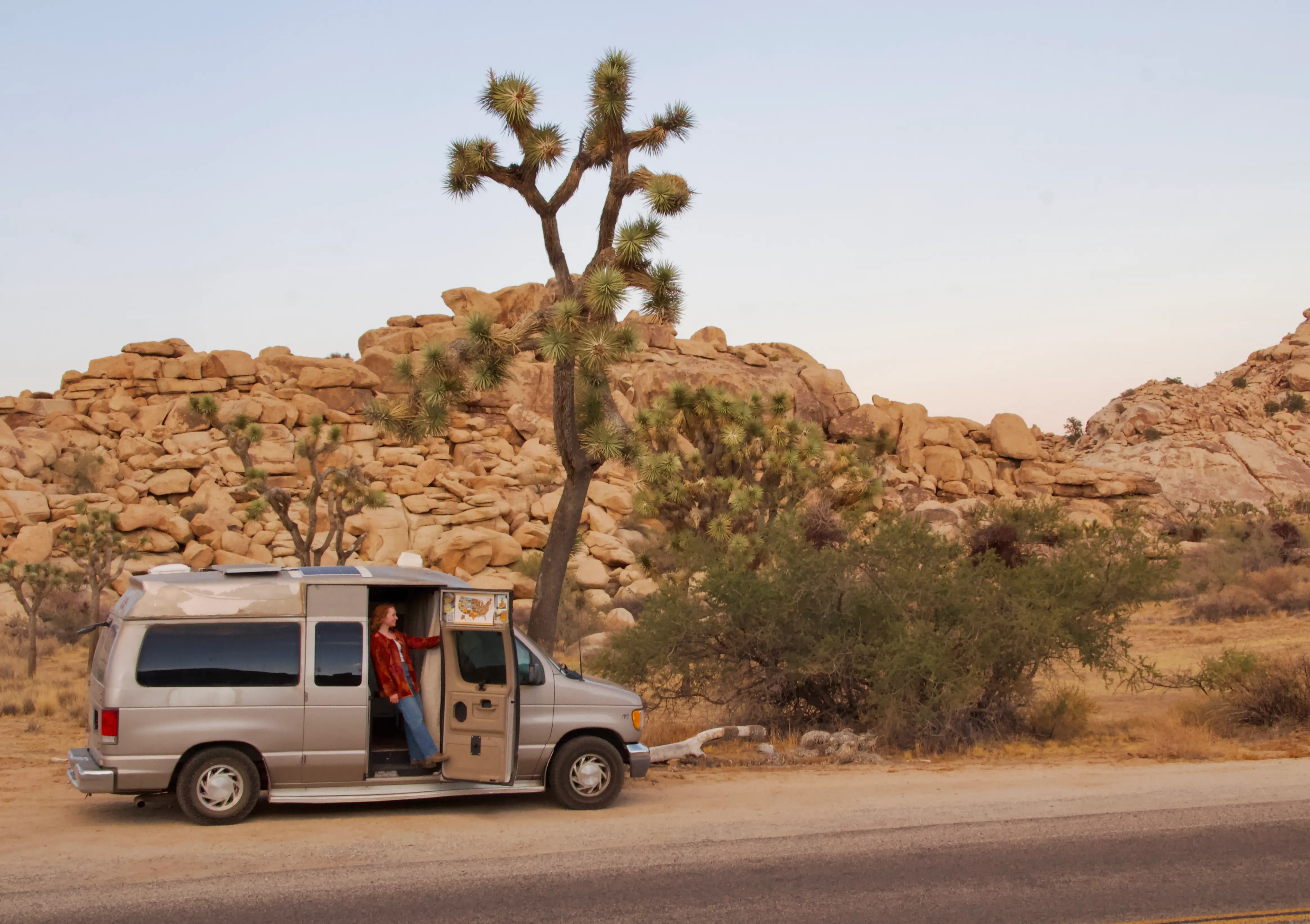 Woman in van in Joshua Tree desert