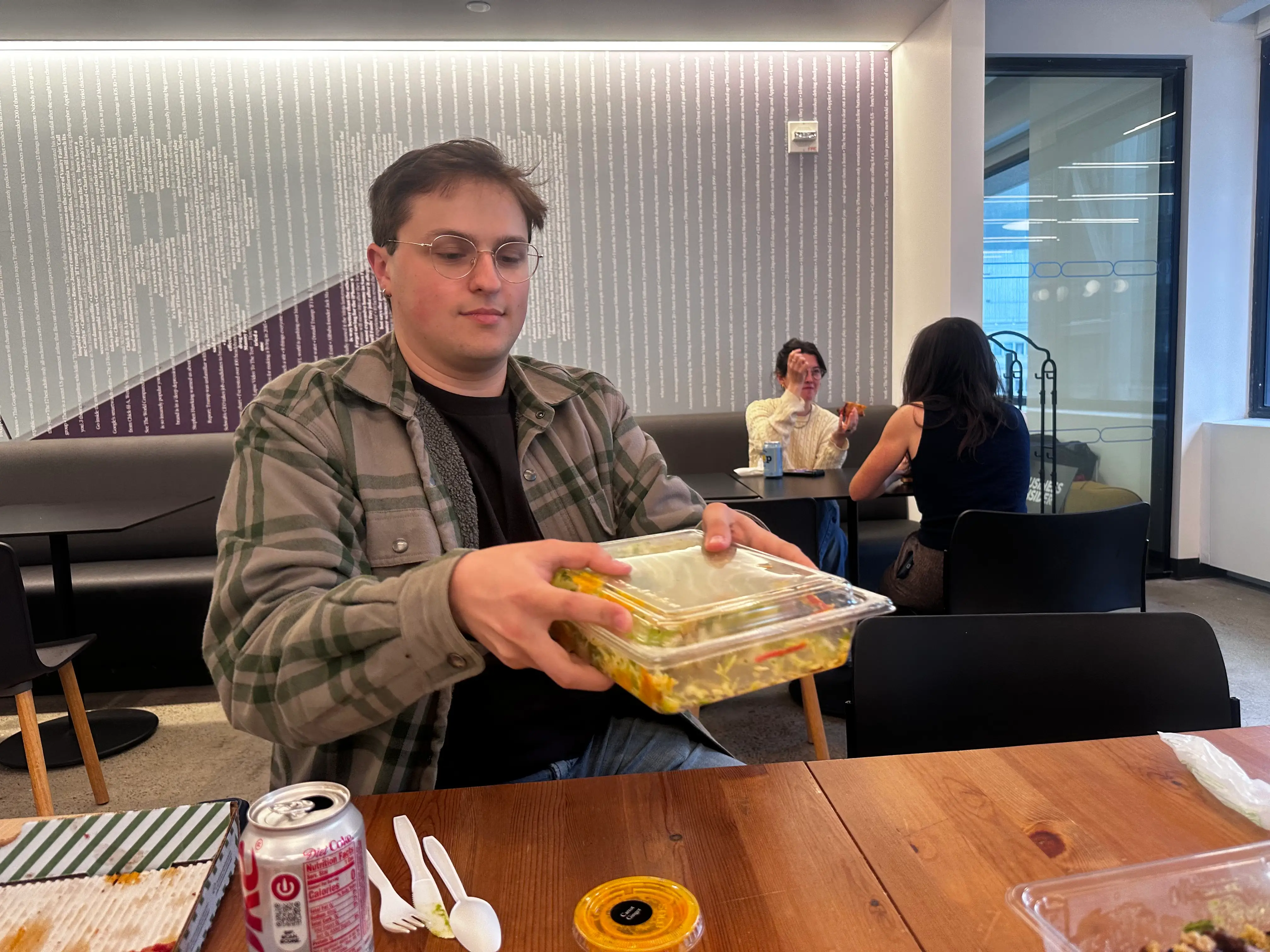 Henry shaking a salad
