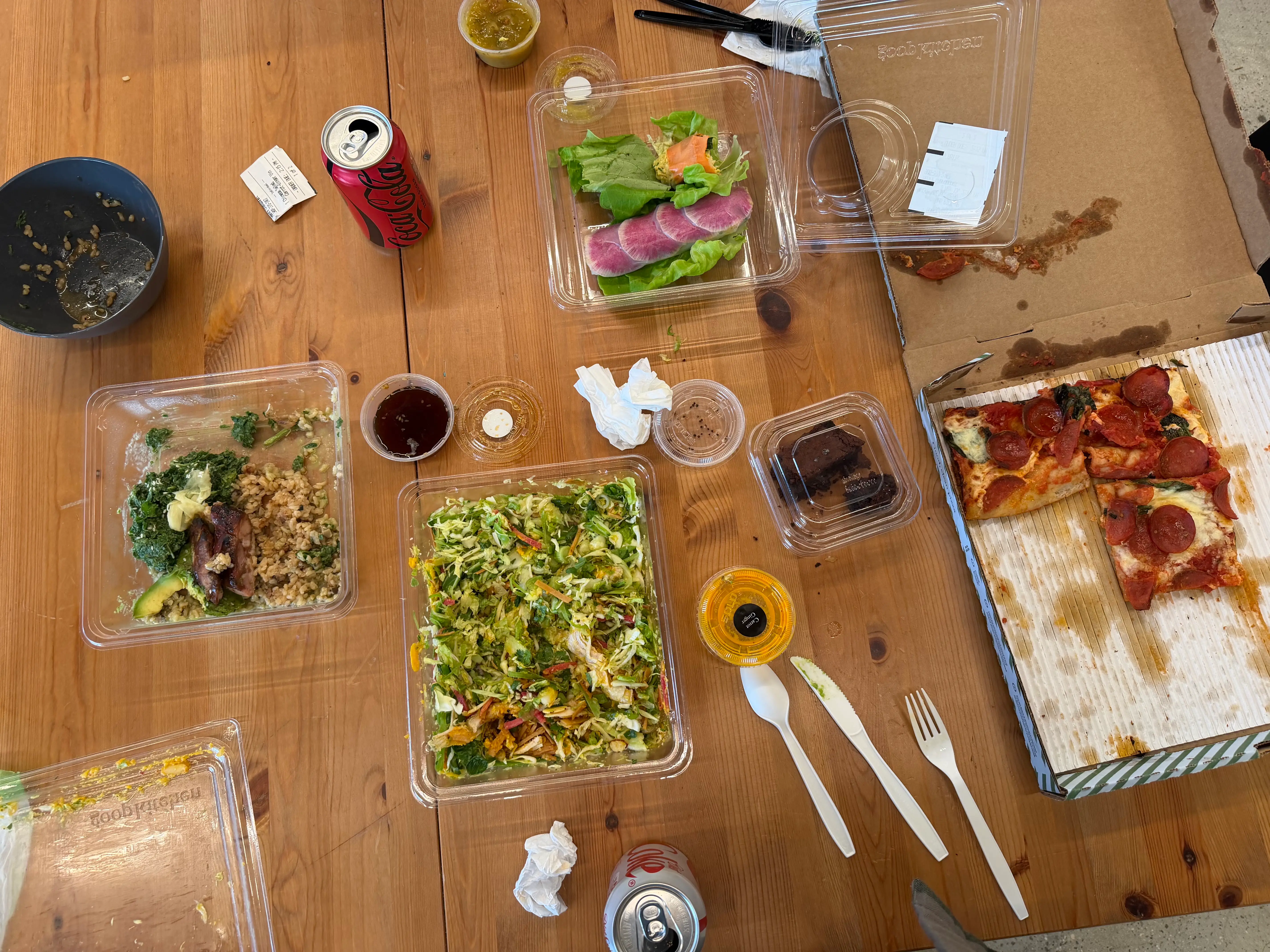 The table of eaten food from Goop Kitchen is pictured.