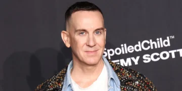 Fashion designer Jeremy Scott gets a huge cheer after ripping up his AI-written commencement speech