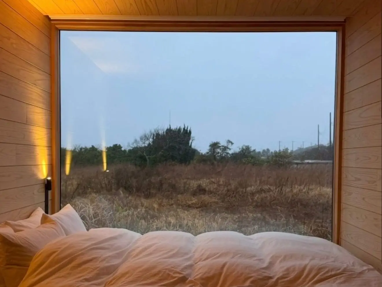 A bed in a room at A Cabin Company in Japan.