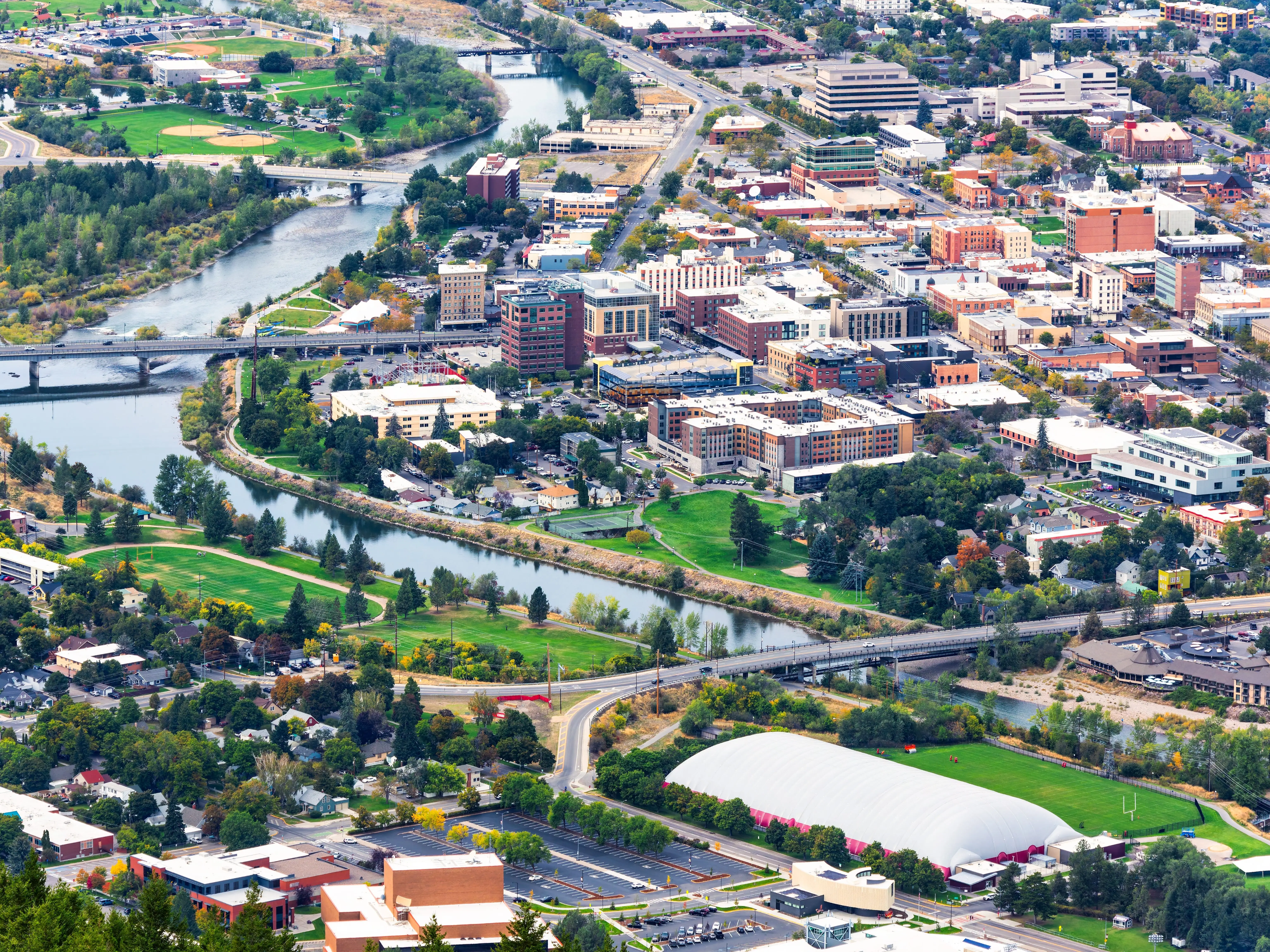 Aerial view of Missoula, Montana from the M trail. Missoula is a city in and the county seat of Missoula County, Montana. It is located along the Clark Fork River.