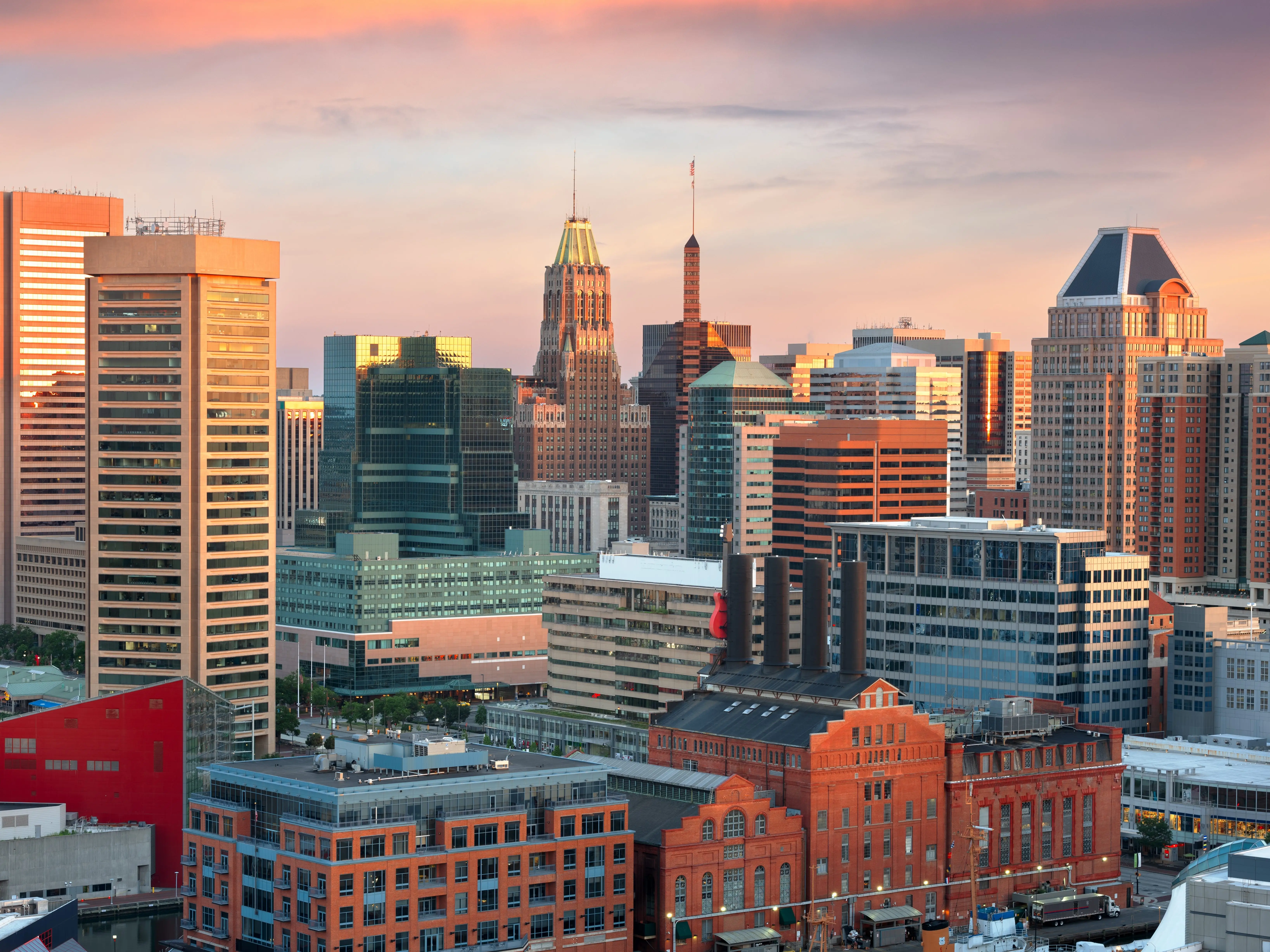 Baltimore, Maryland, USA Skyline over the Inner Harbor at dusk.