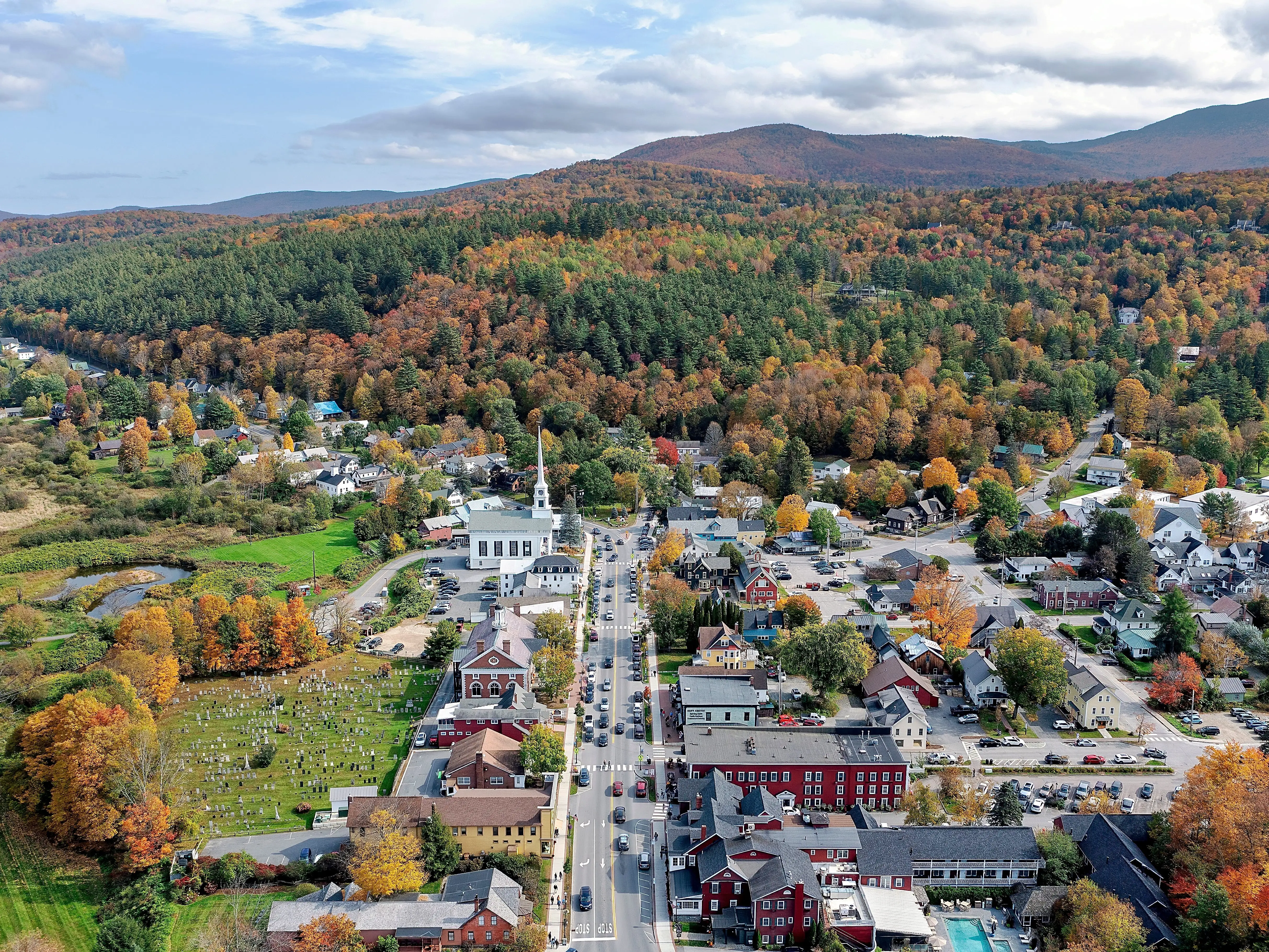 Aerial view of Stowe Vermont and the Green Mountains with autumn colors.