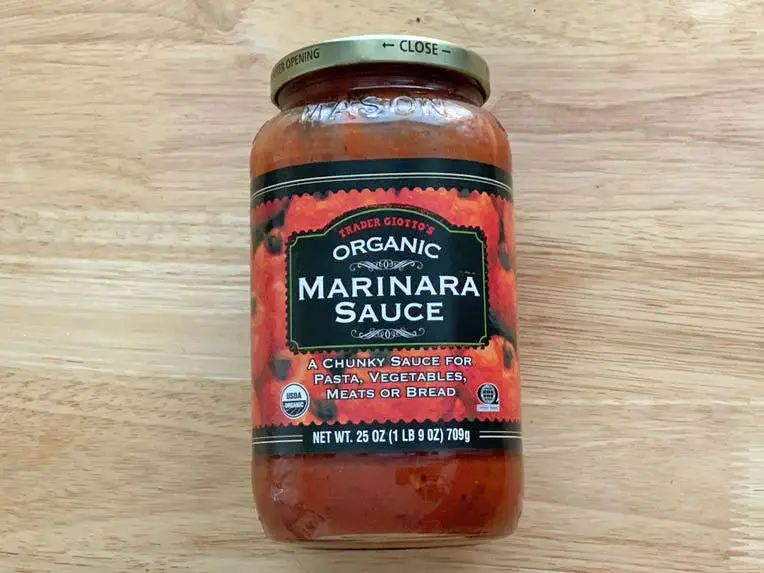 A jar of Trader Joe's organic marinara sauce.