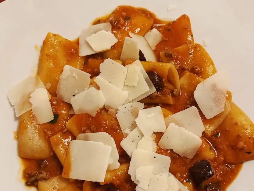 Pasta with red sauce and cheese in Florence, Italy.