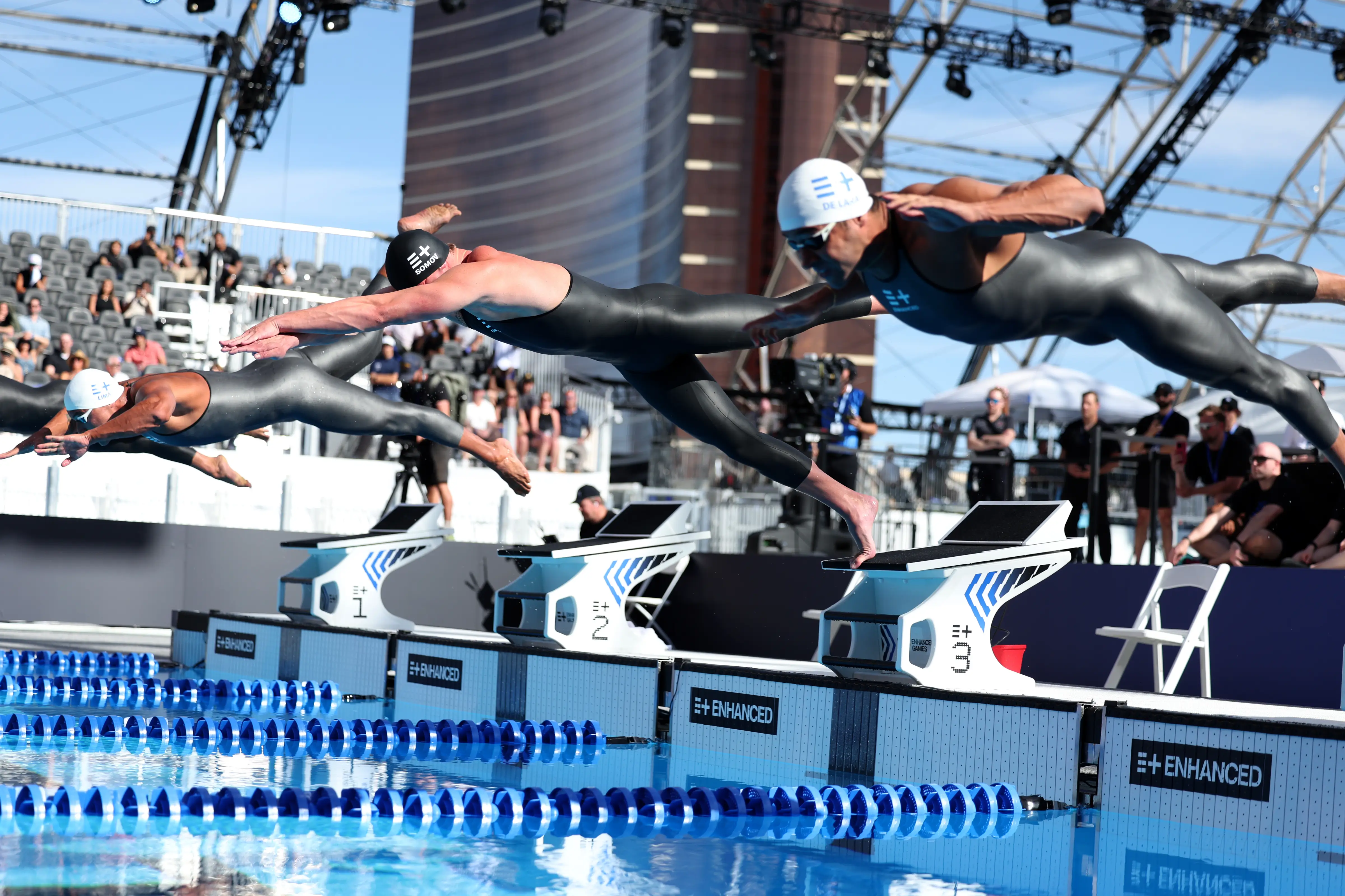 Swimmers dive into the pool during the mens 50m breaststroke in the 2026 Enhanced Games