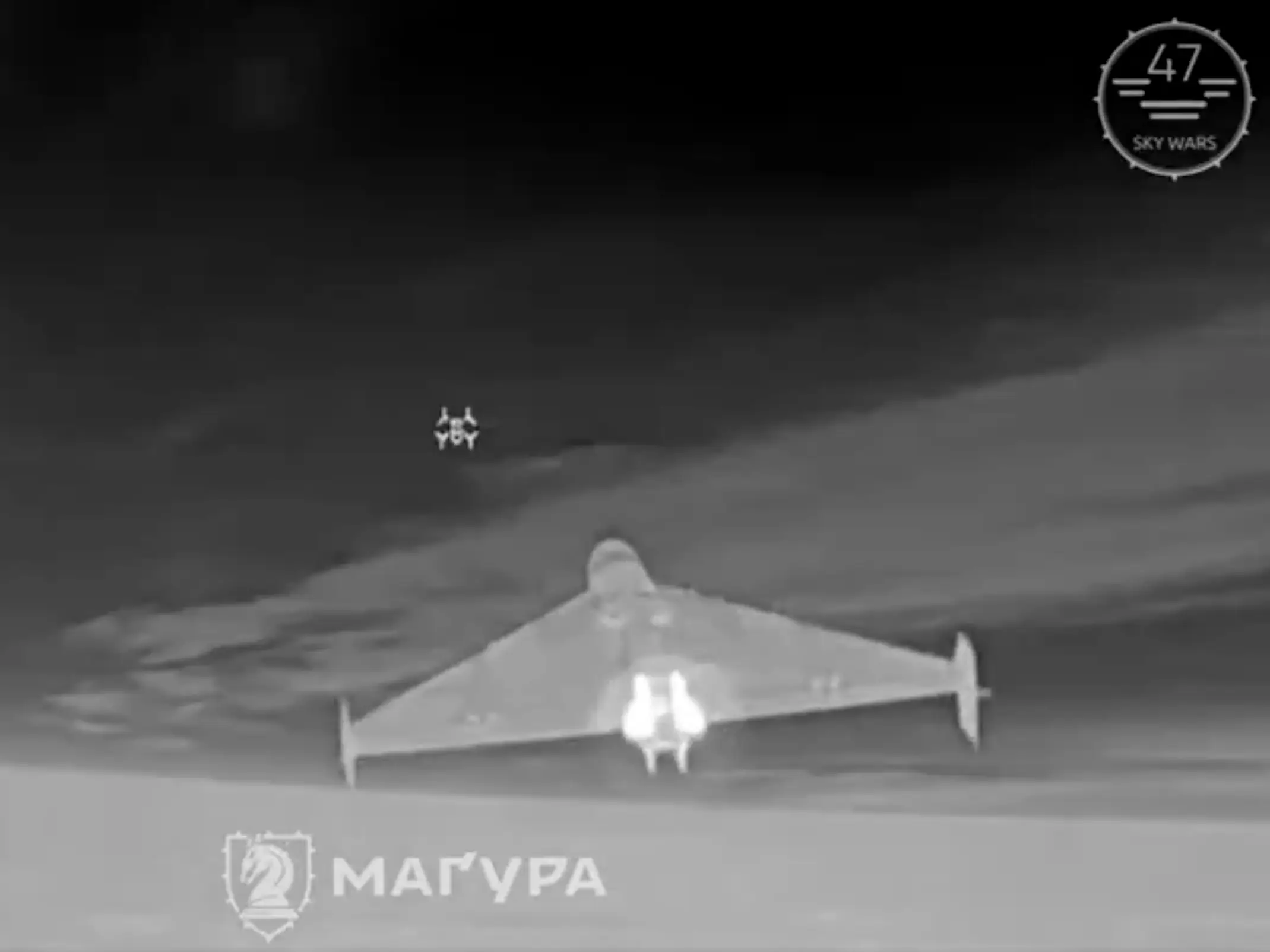 A Russian Shahed drone filmed by Ukrainian air defenses.