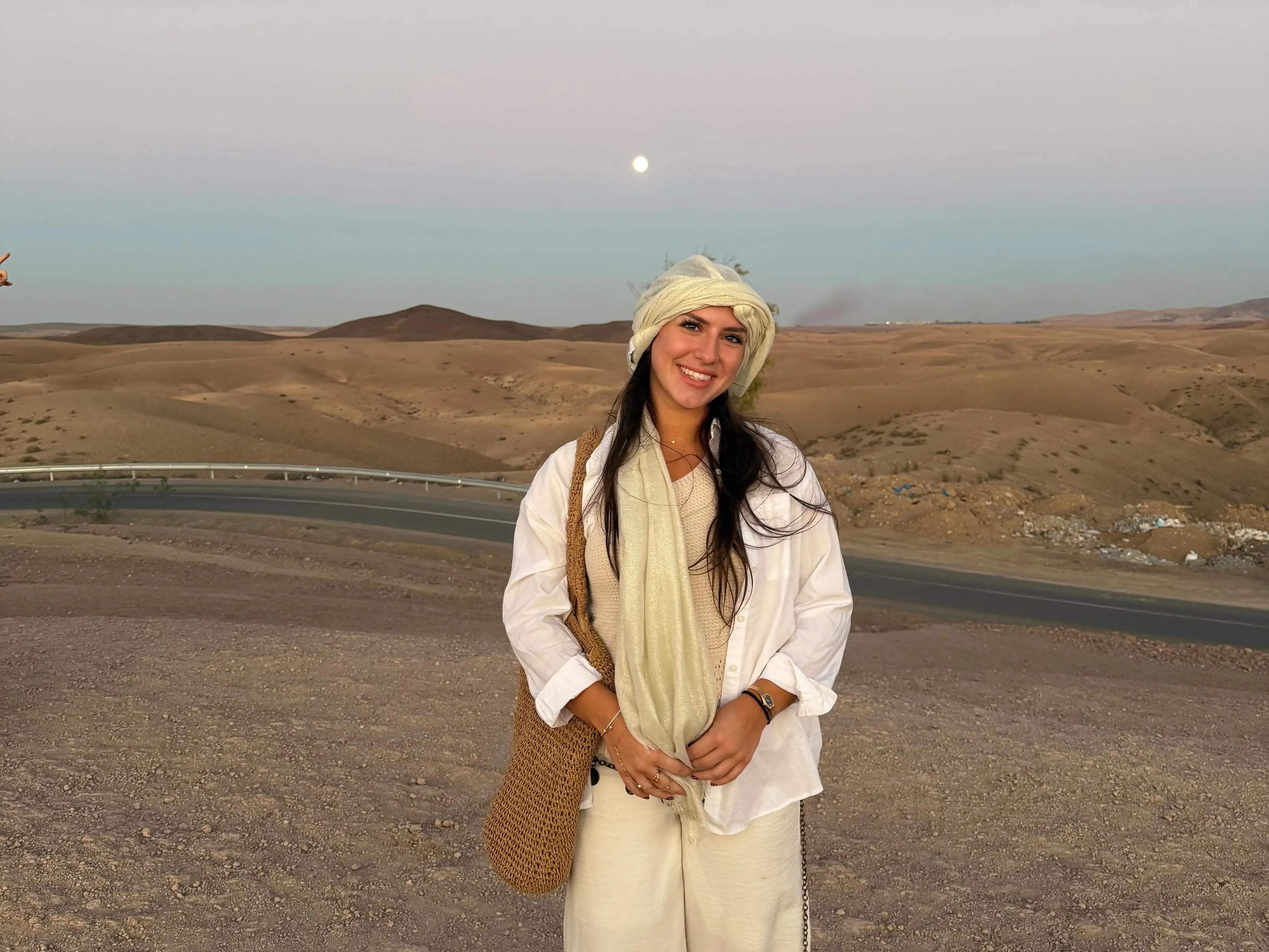 Amanda poses in the desert in Morocco.