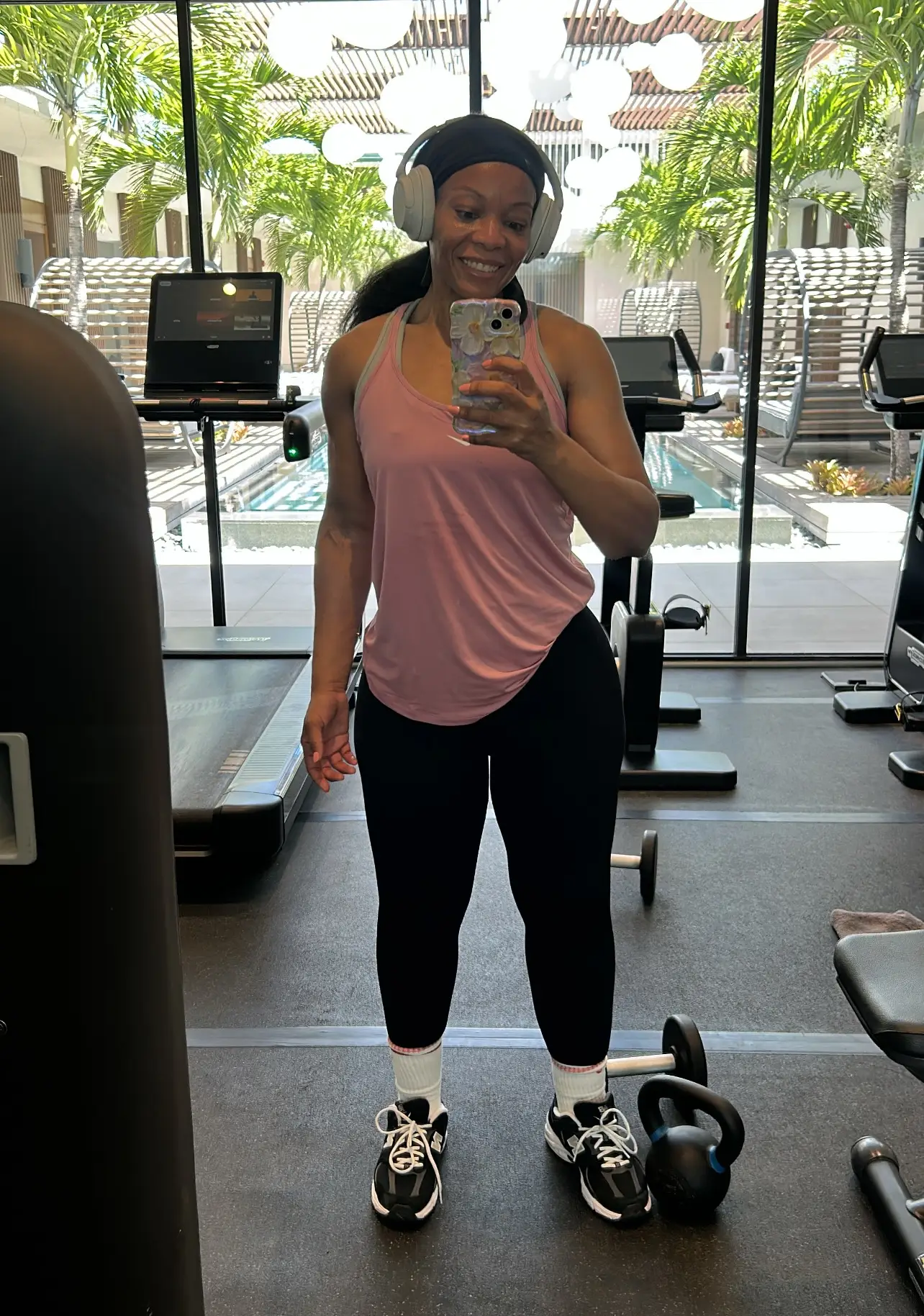 A mirror seflie at a hotel gym.