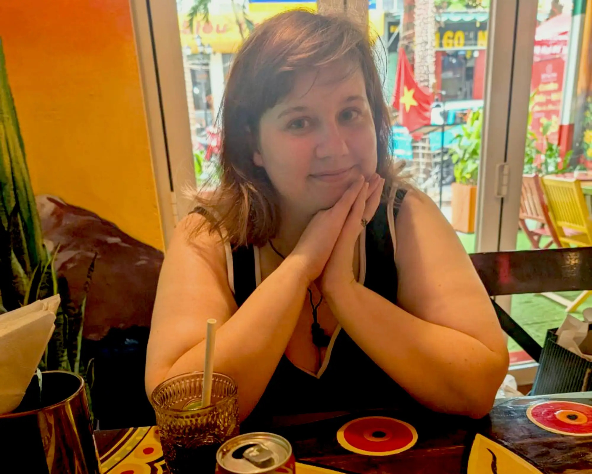 The author while dining out in Vietnam.