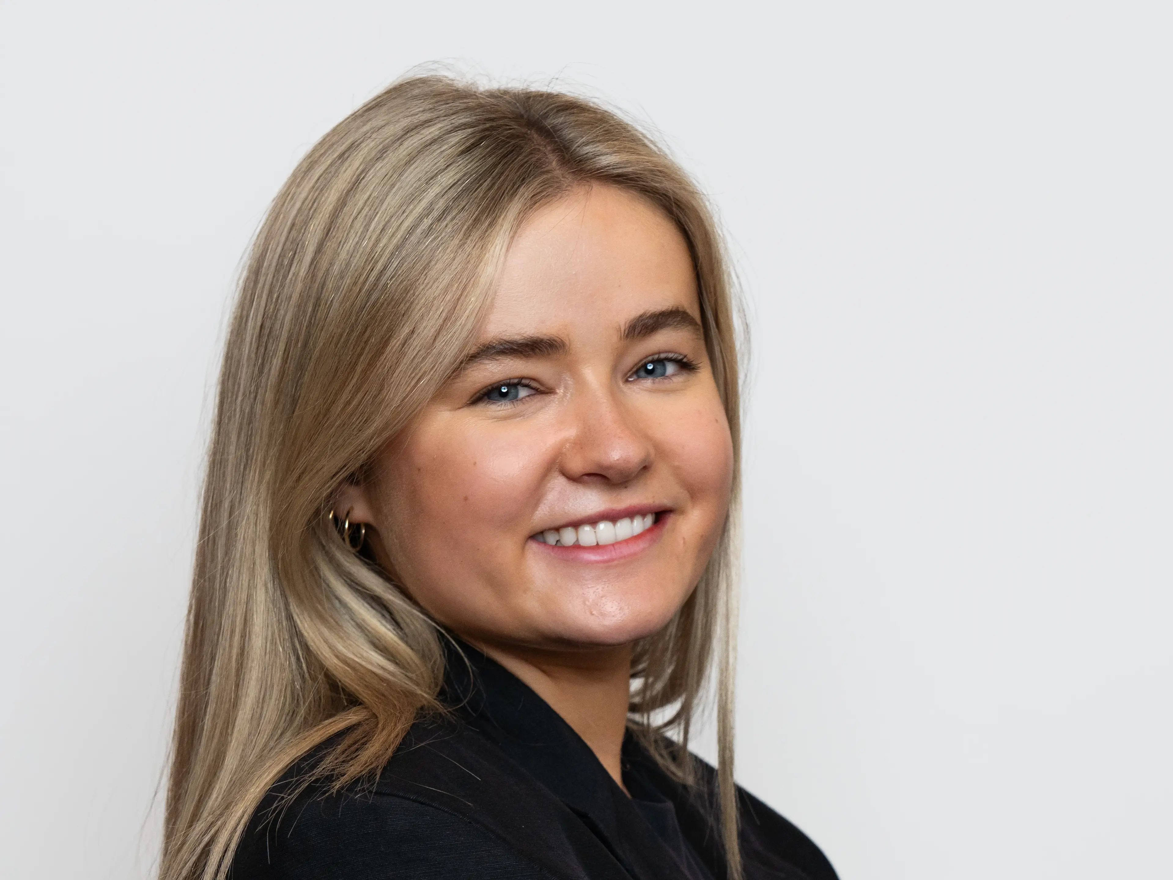 A headshot of a young woman.