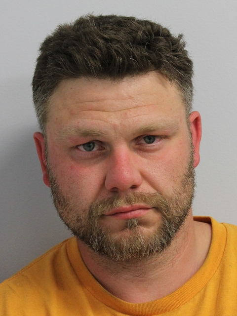 Anthony J. Rhodes is charged with first-degree arson and manufacturing an explosive device.