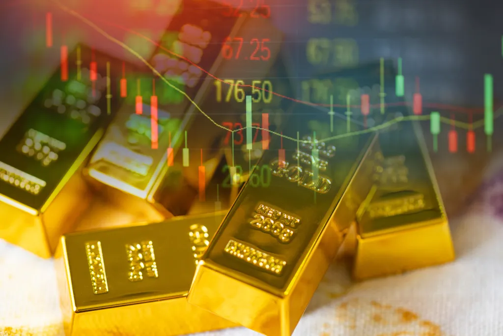 Gold bars overlaid with a stock market chart.