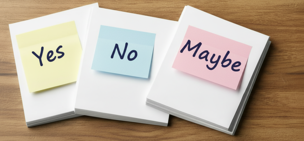 Three stacks of paper with sticky notes saying 