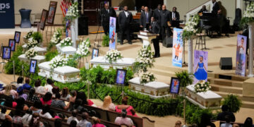 Eight children mourned at mass funeral that captured national attention
